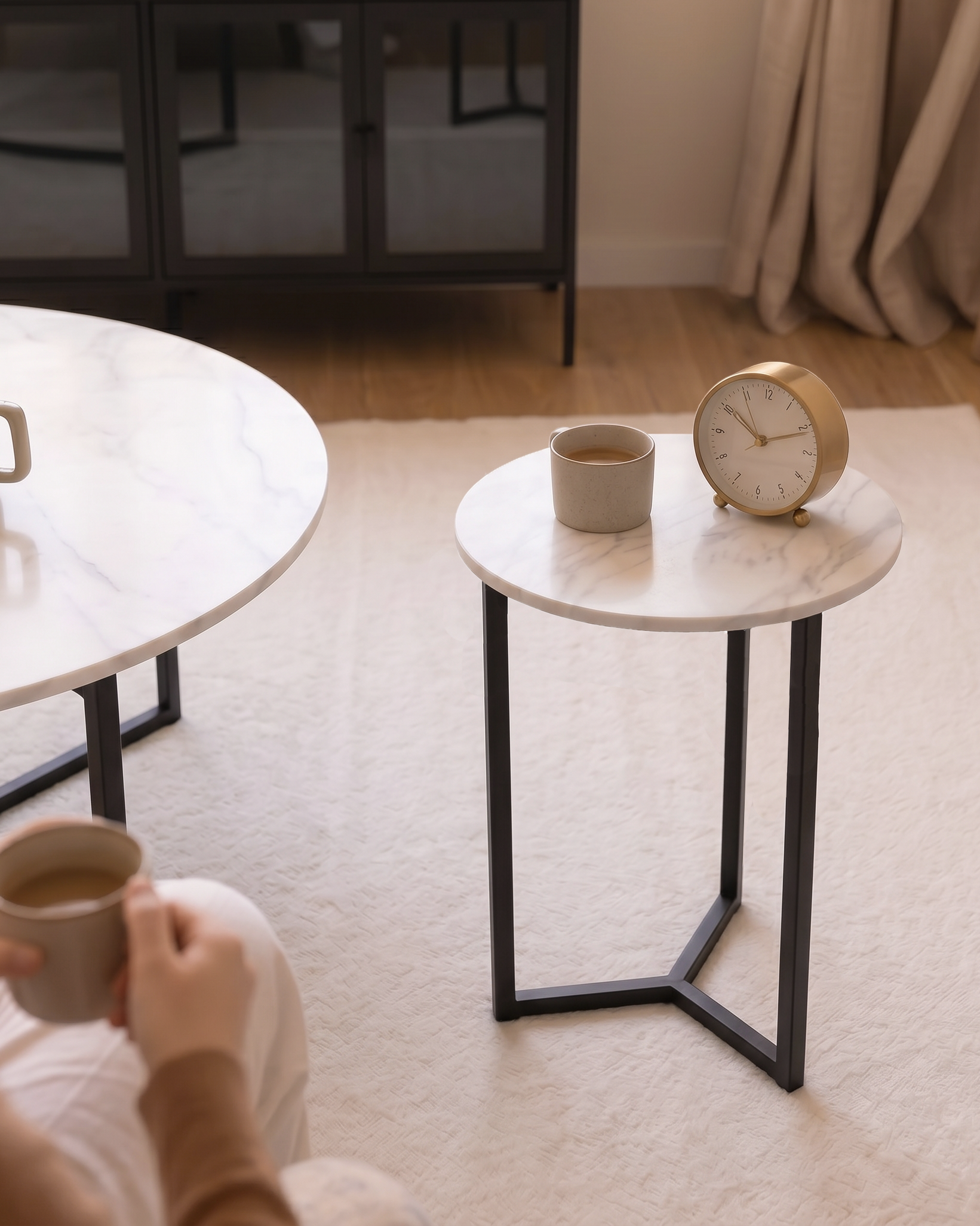 Balear round auxiliary table with carrara porcelain top and black metal leg Ø 50 cm