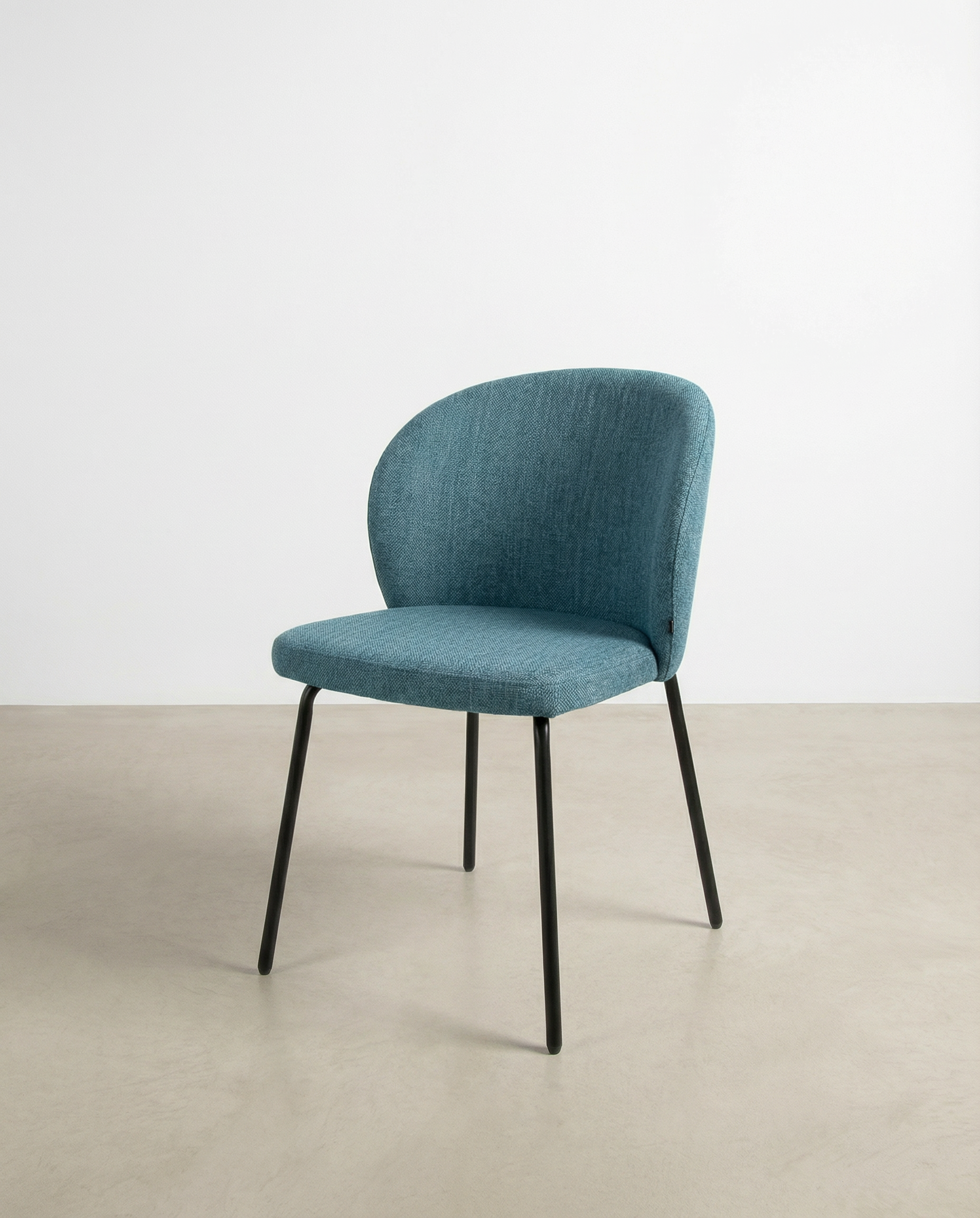 Bergen chair with blue upholstery and black metal legs
