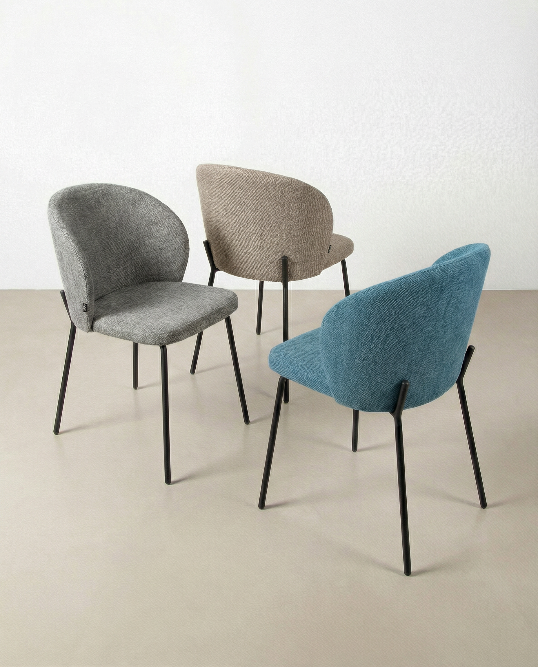 Bergen chair with brown upholstery and black metal legs