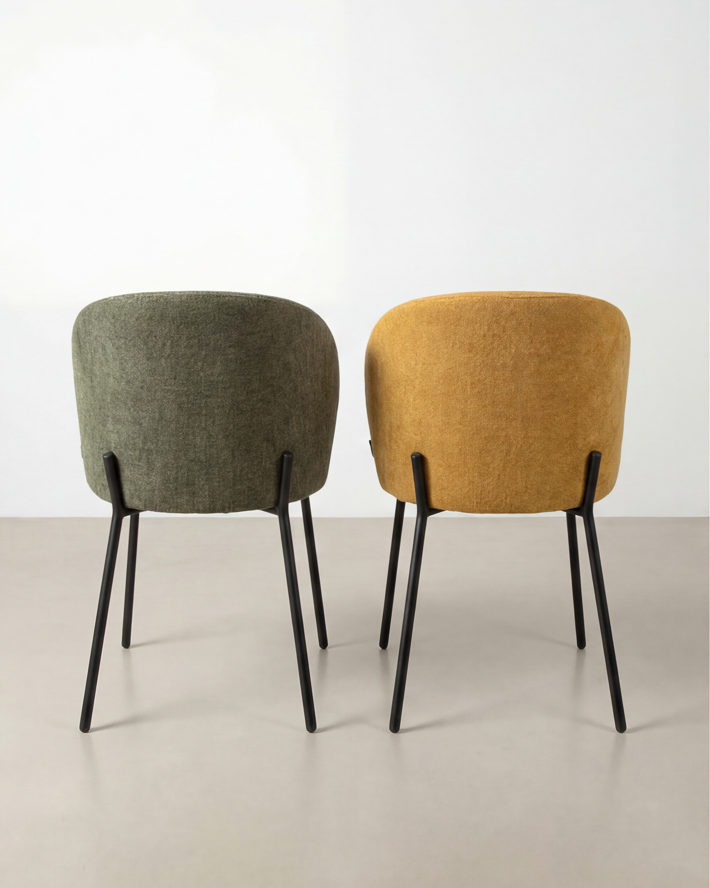 Bergen chair with mustard upholstery and black metal legs