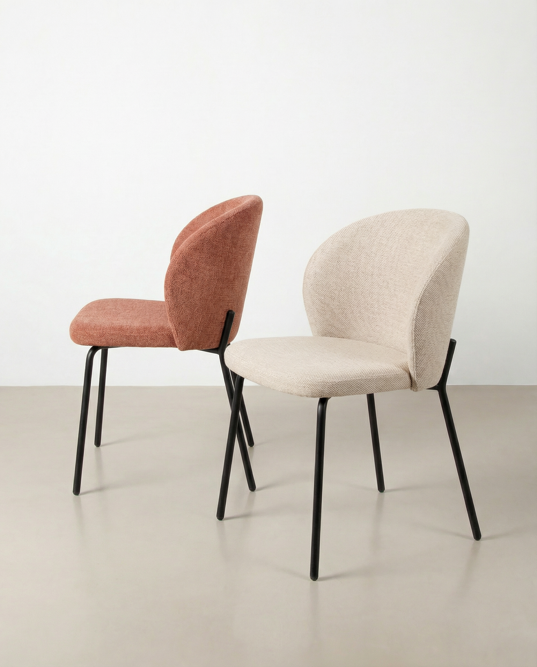 Bergen chair with salmon upholstery and black metal legs