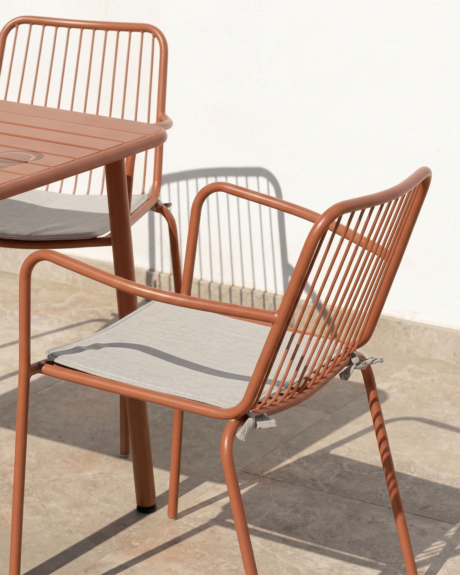 Ohana terracotta metal chair with cushion