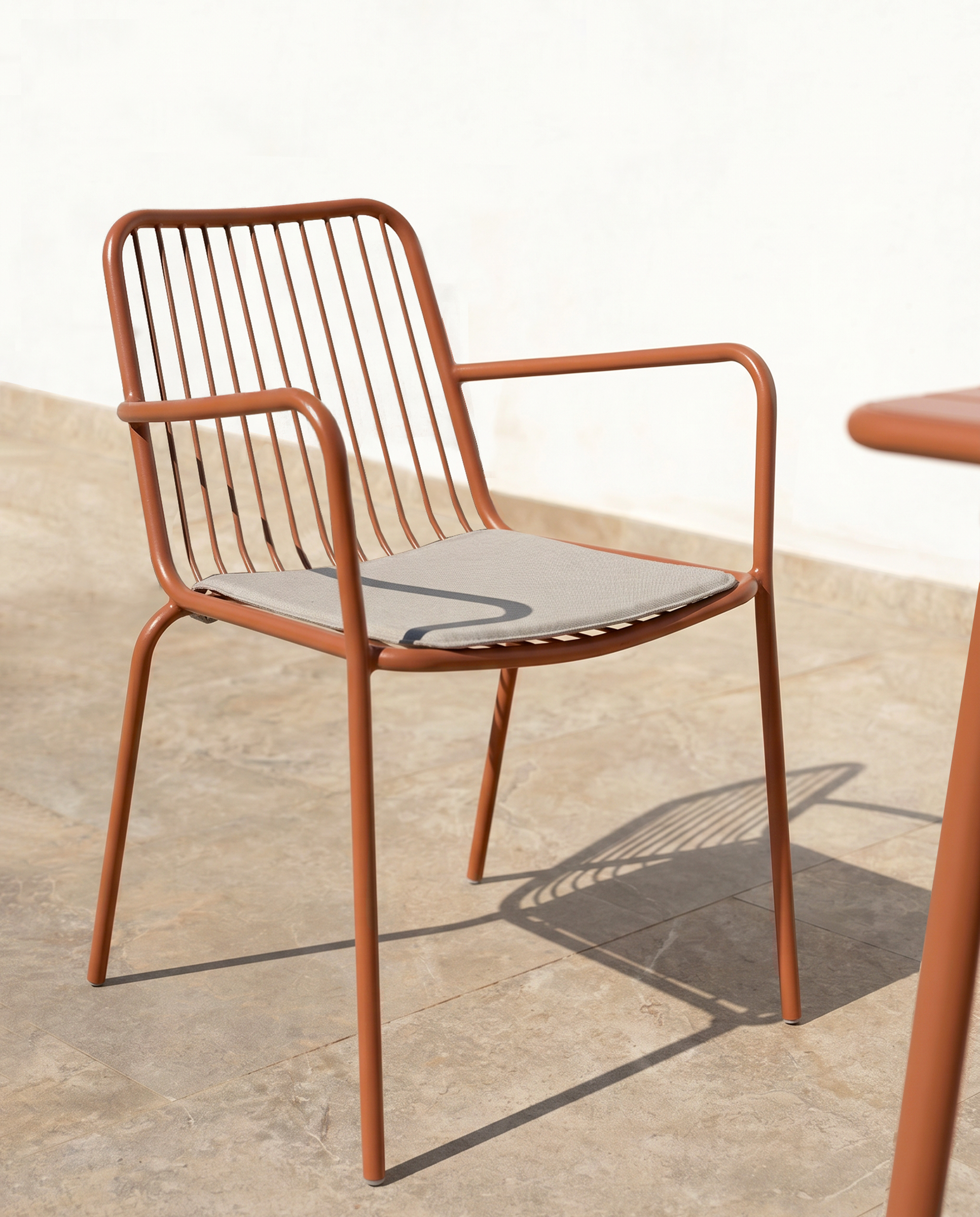 Ohana terracotta metal chair with cushion