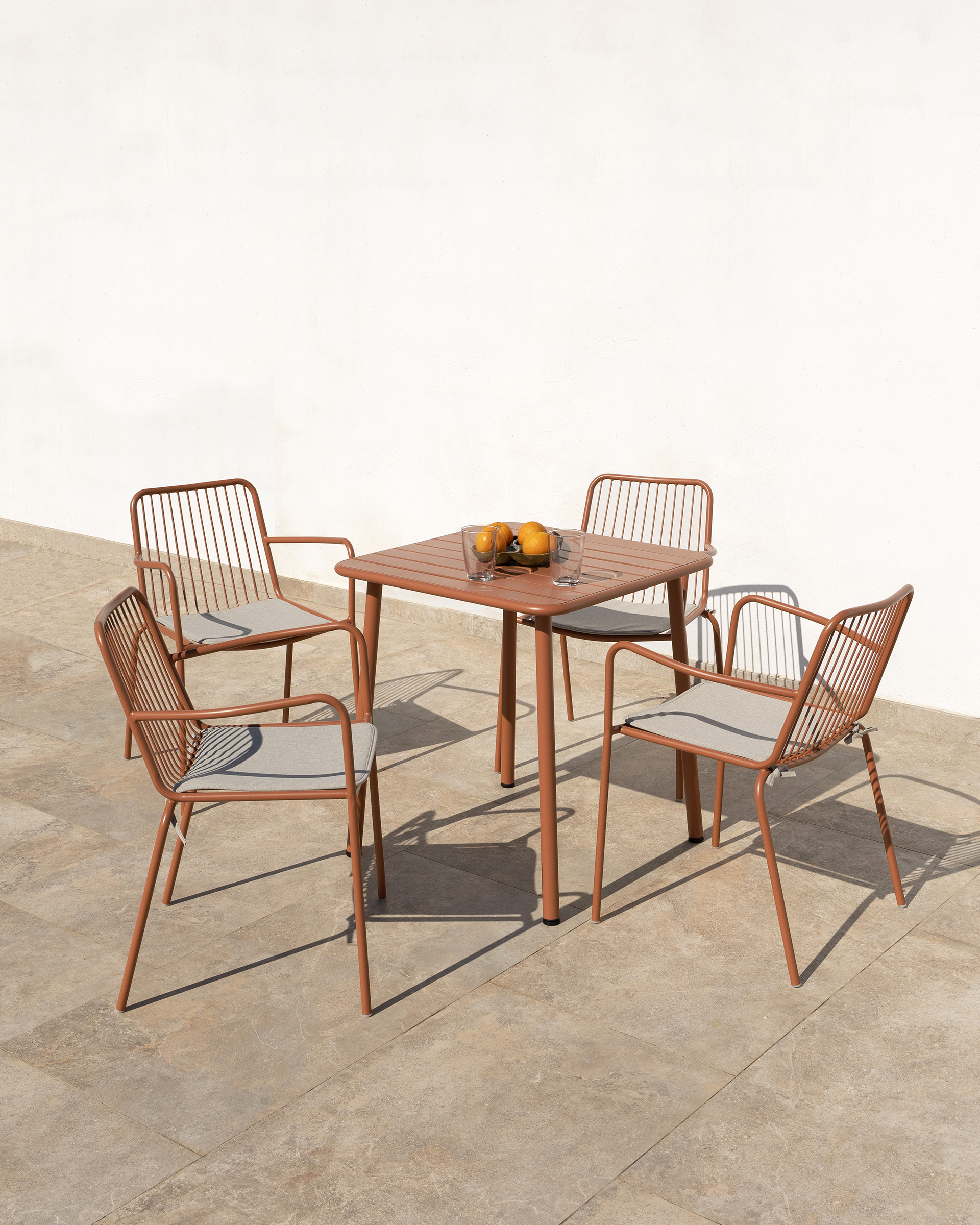 Ohana terracotta metal chair with cushion