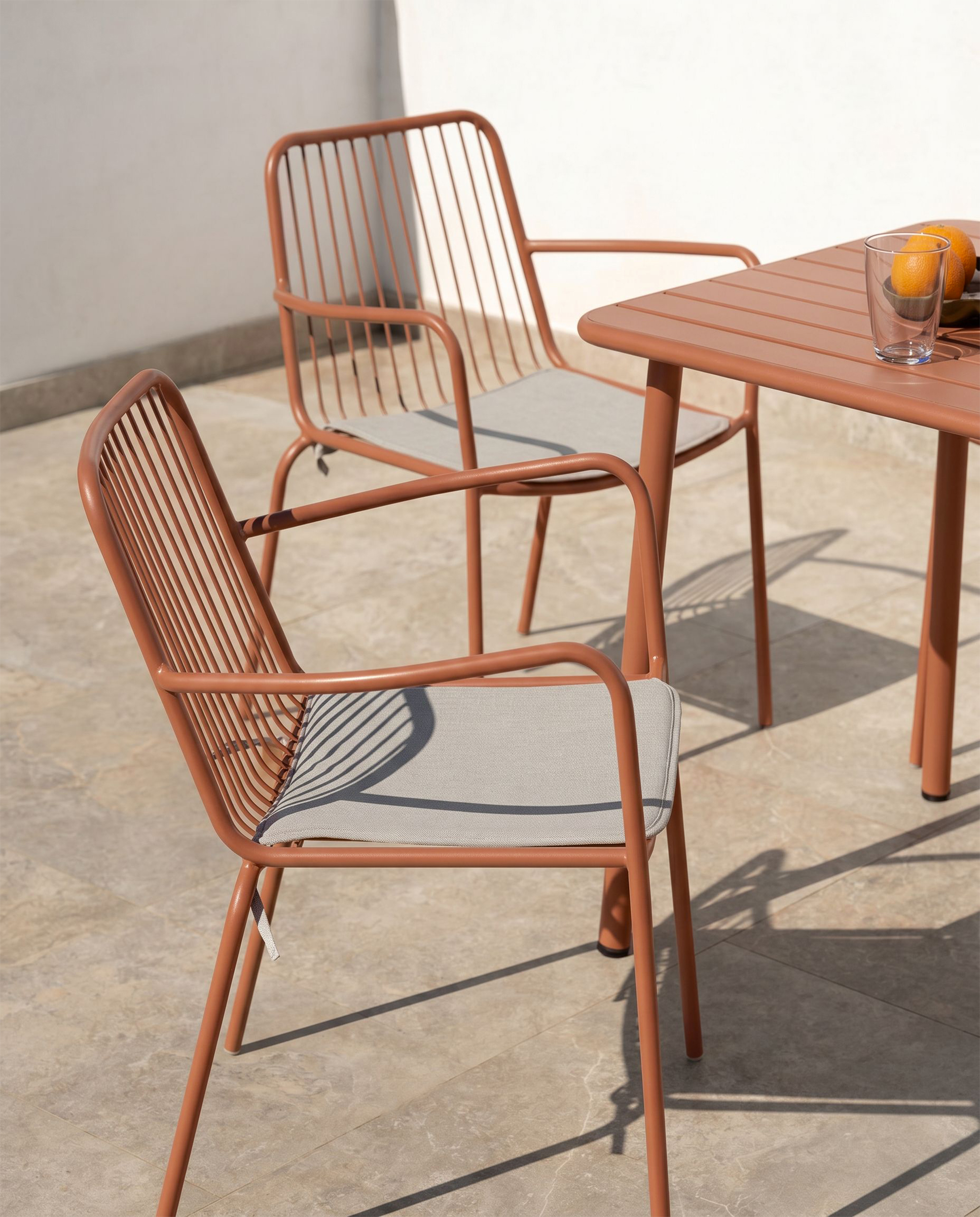 Ohana terracotta metal chair with cushion