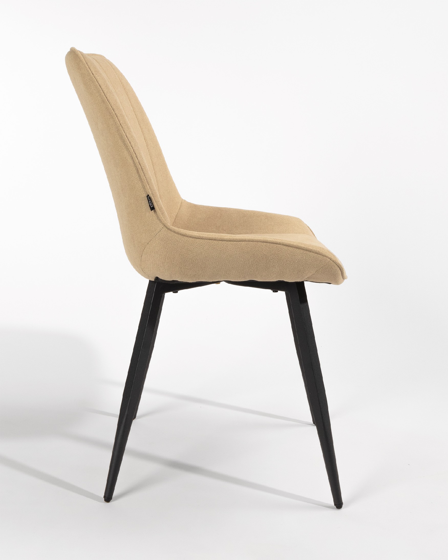 Ankara chair with cream upholstery and black legs