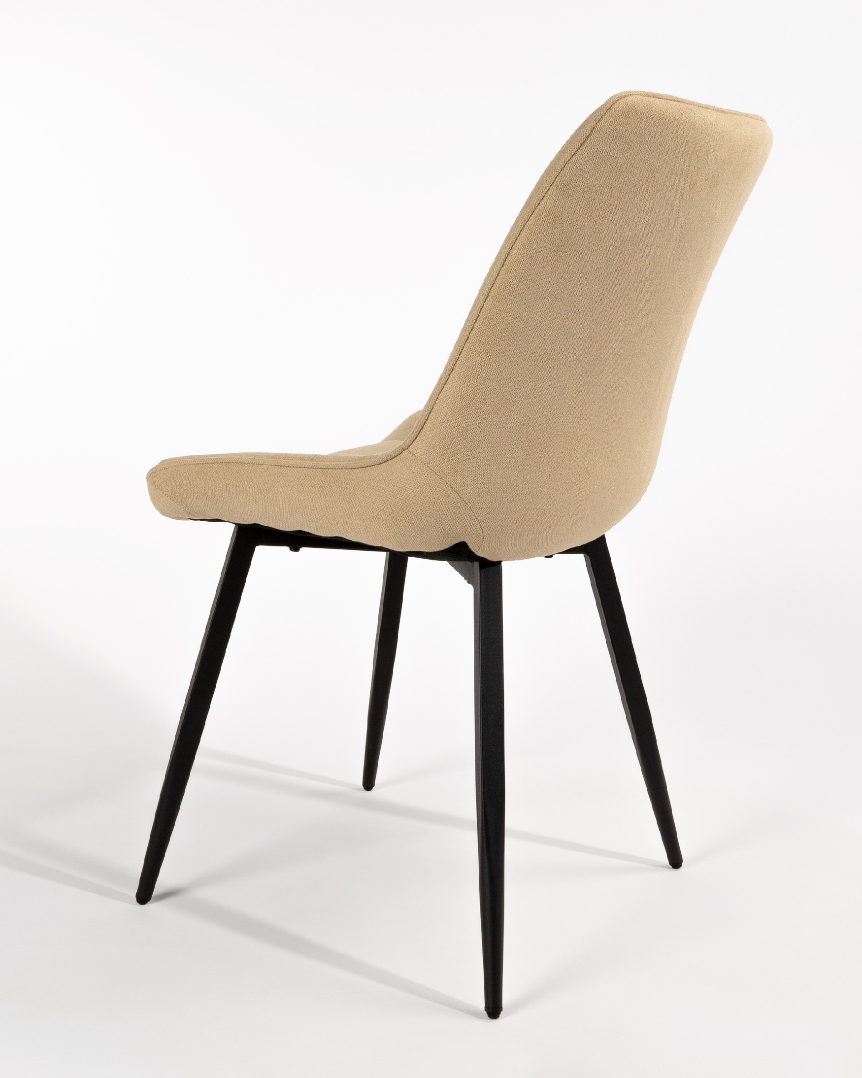 Ankara chair with cream upholstery and black legs
