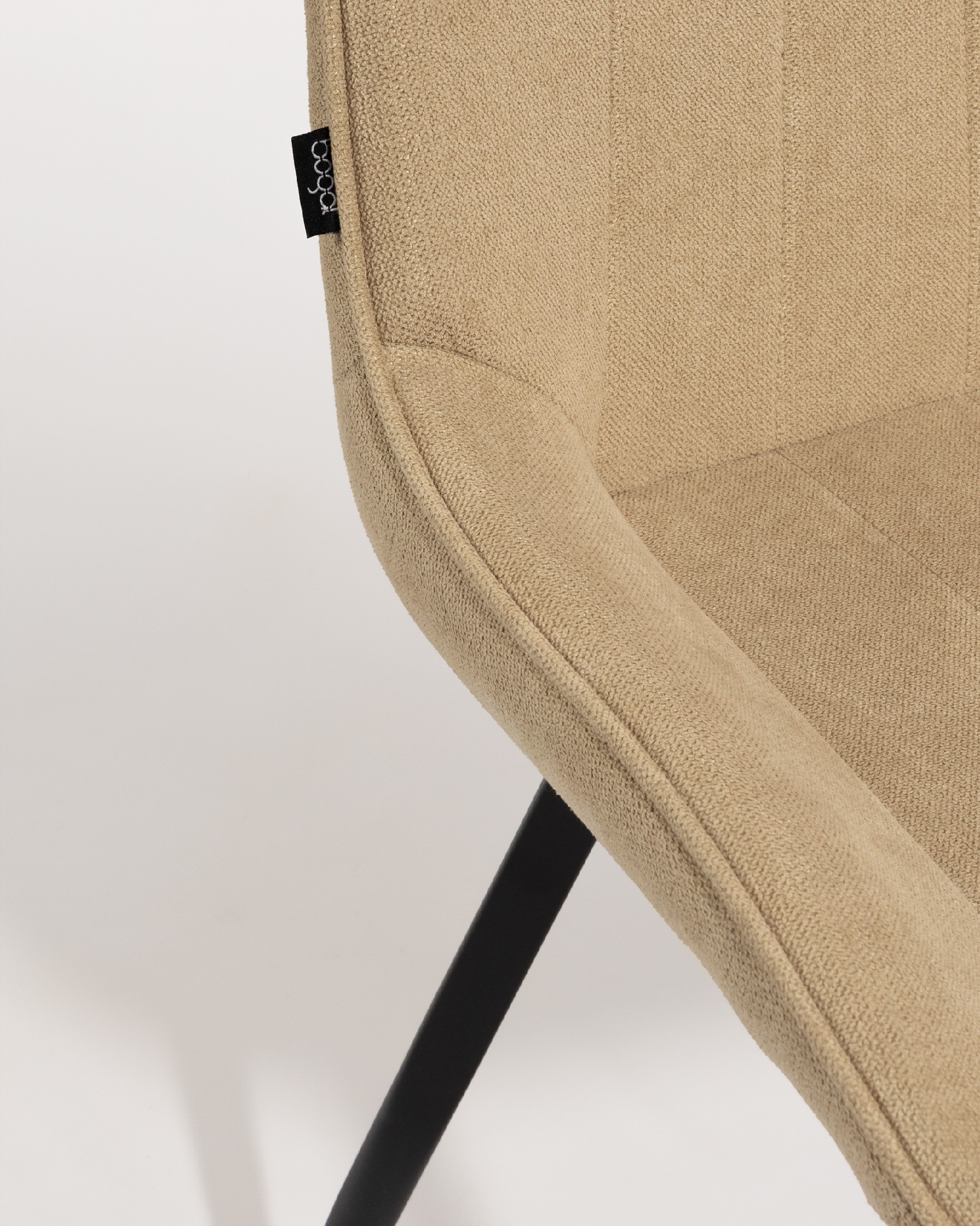 Ankara chair with cream upholstery and black legs
