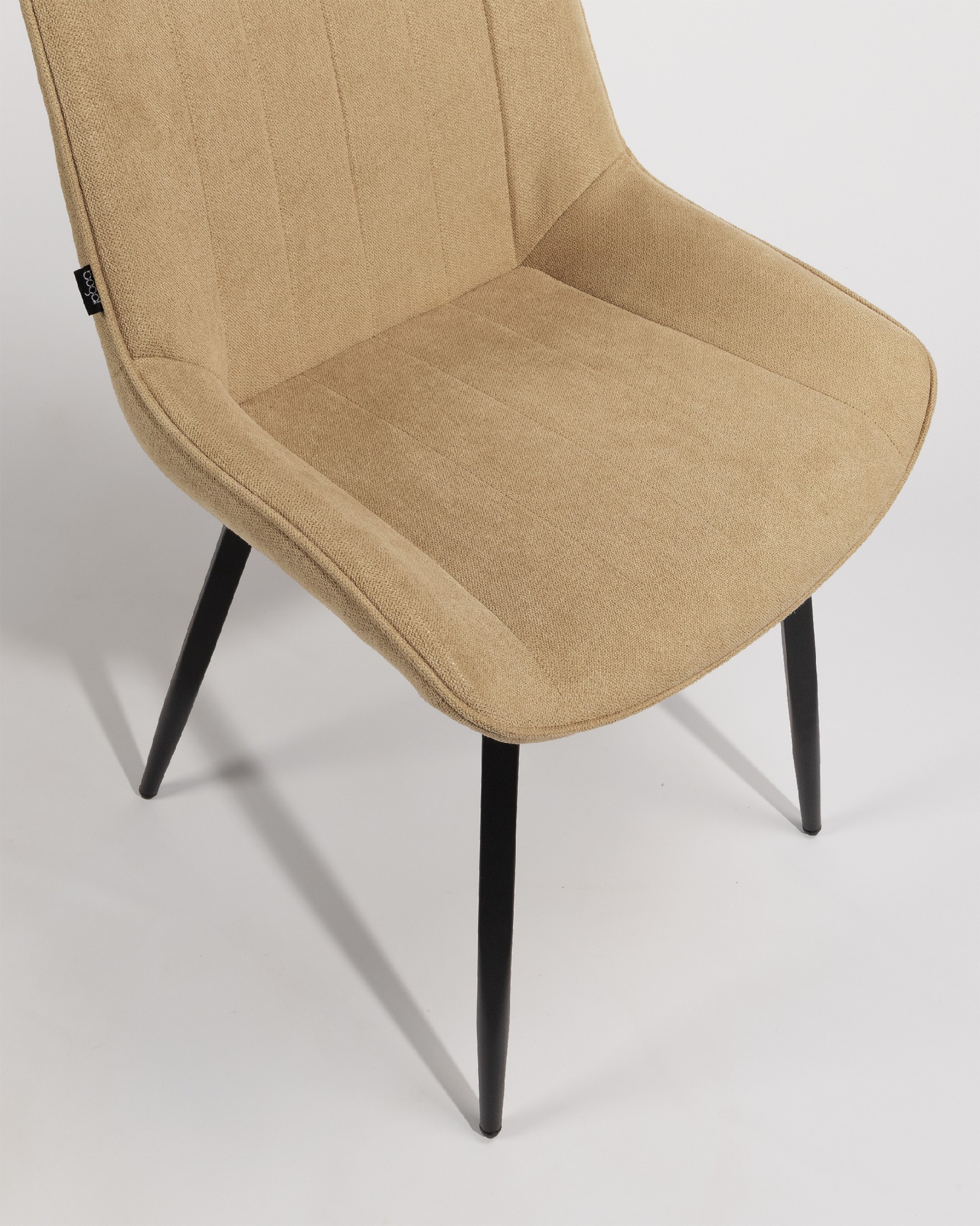 Ankara chair with cream upholstery and black legs