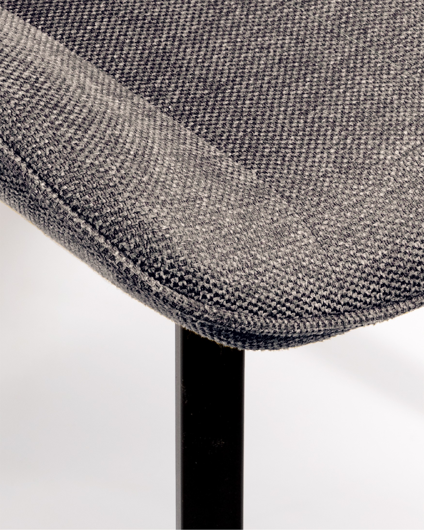Ankara chair with gray upholstery and black legs