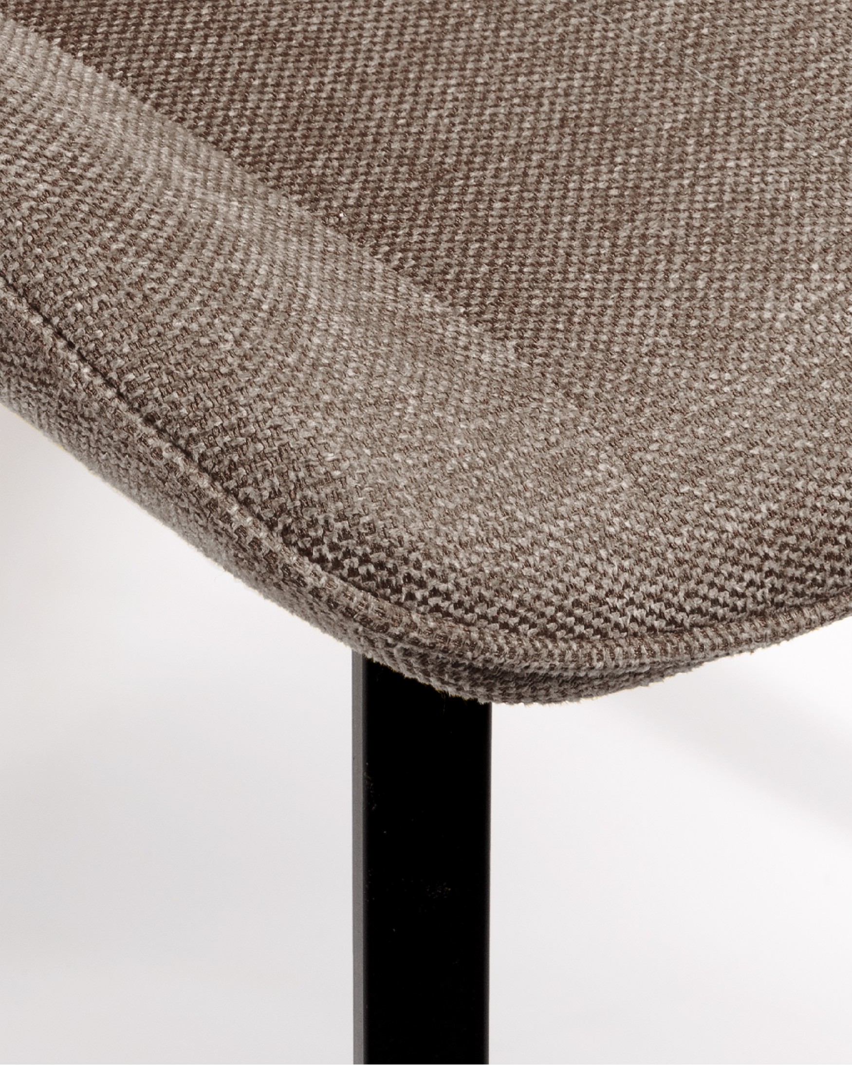 Ankara chair with brown upholstery and black legs