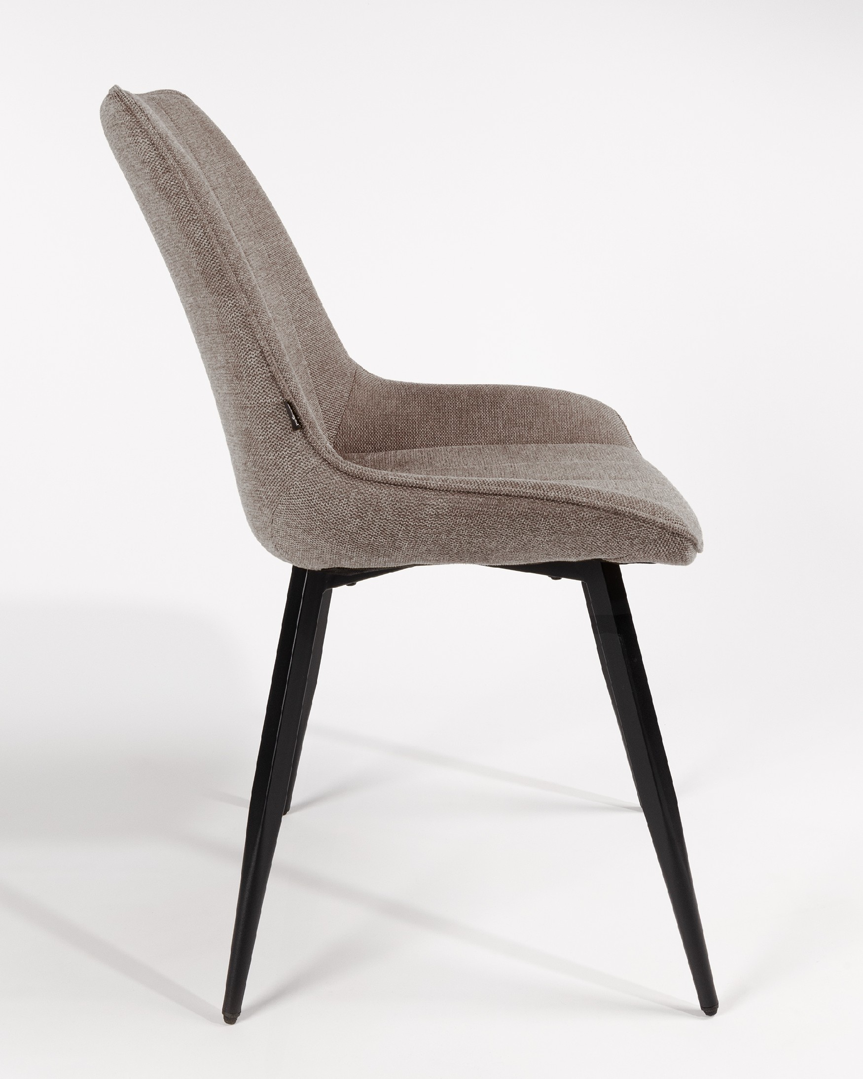 Ankara chair with brown upholstery and black legs
