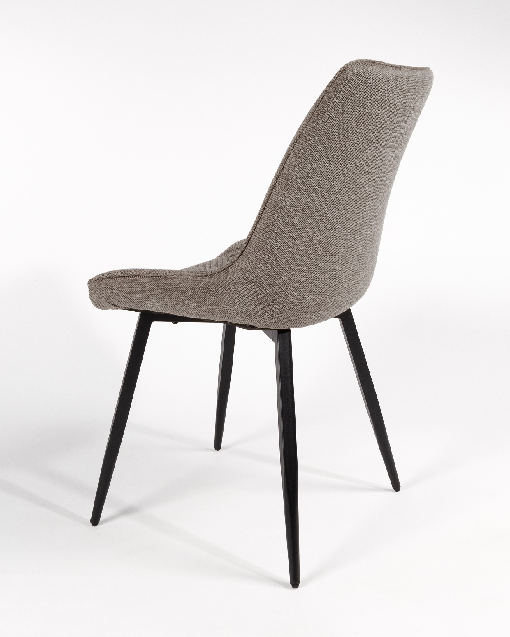 Ankara chair with brown upholstery and black legs