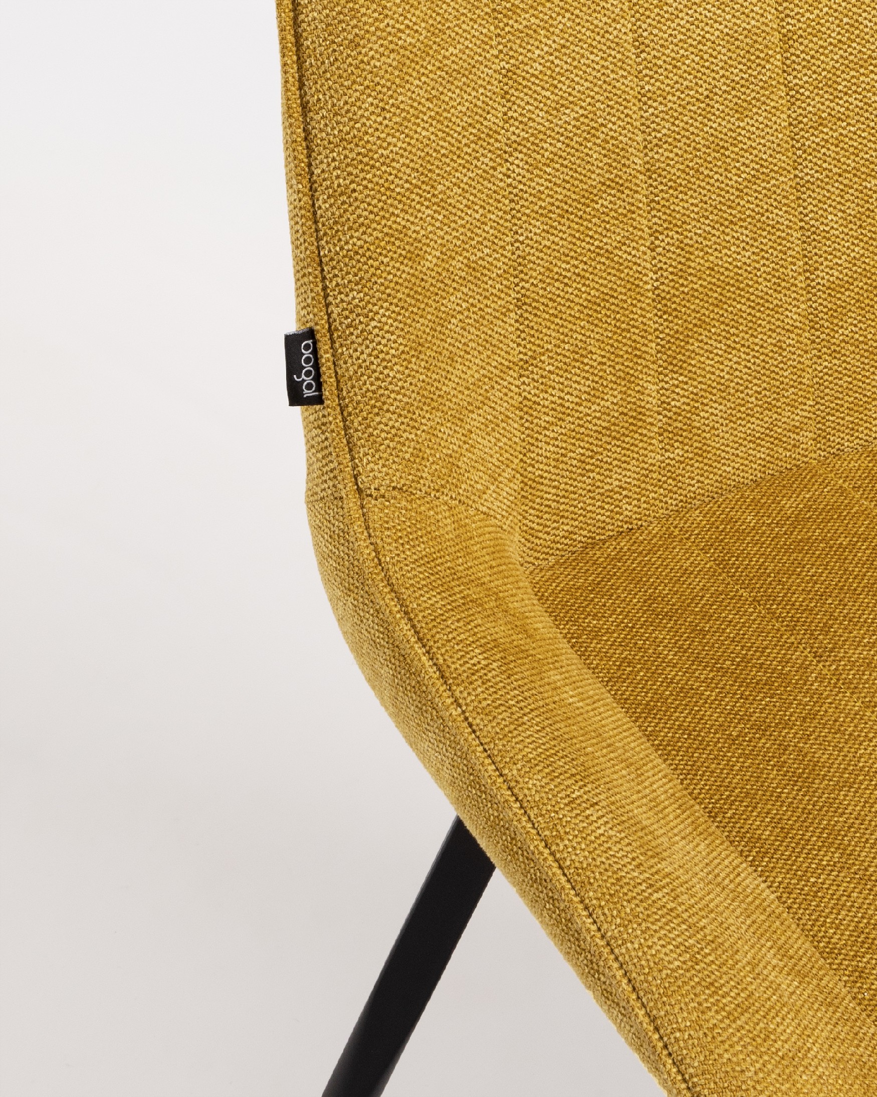 Ankara chair with mustard upholstery and black legs