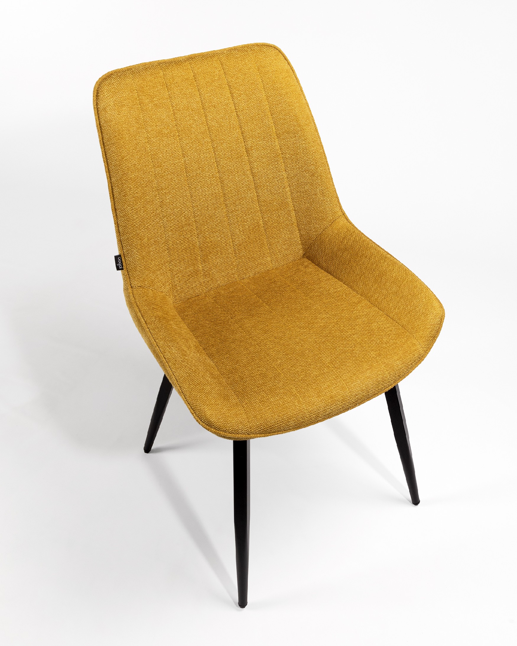 Ankara chair with mustard upholstery and black legs