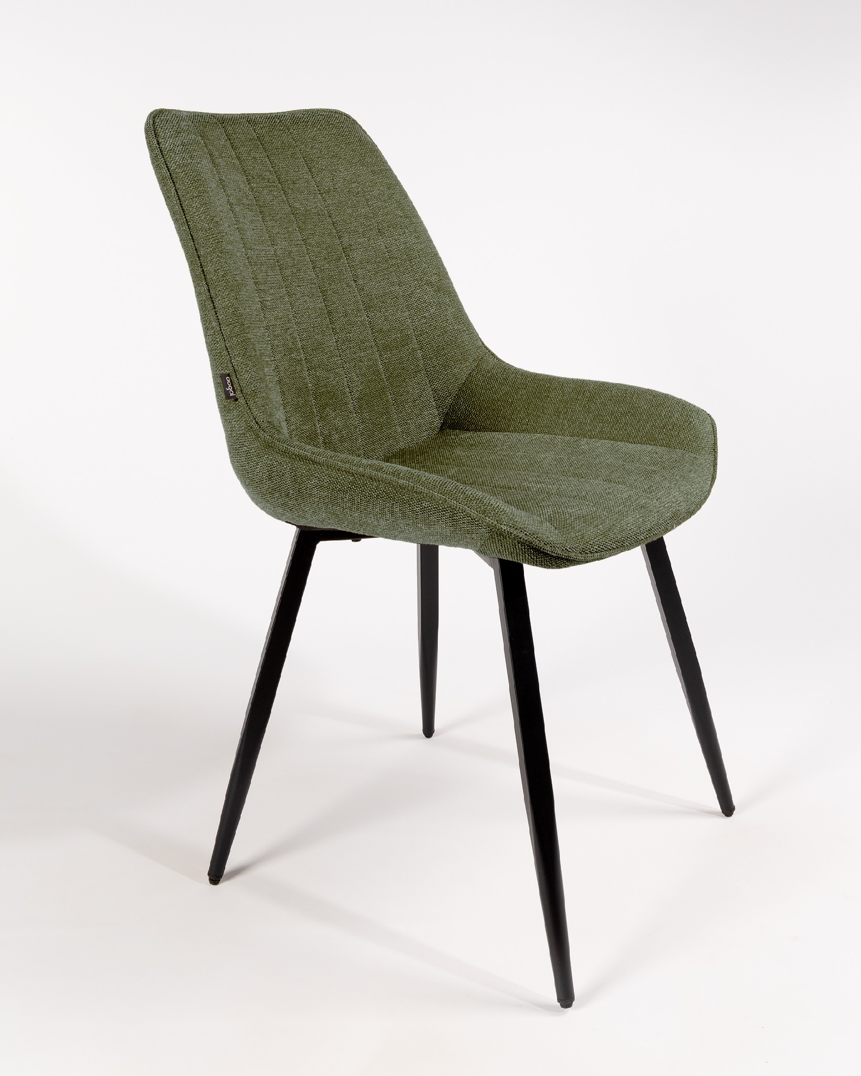 Ankara chair with green upholstery and black legs
