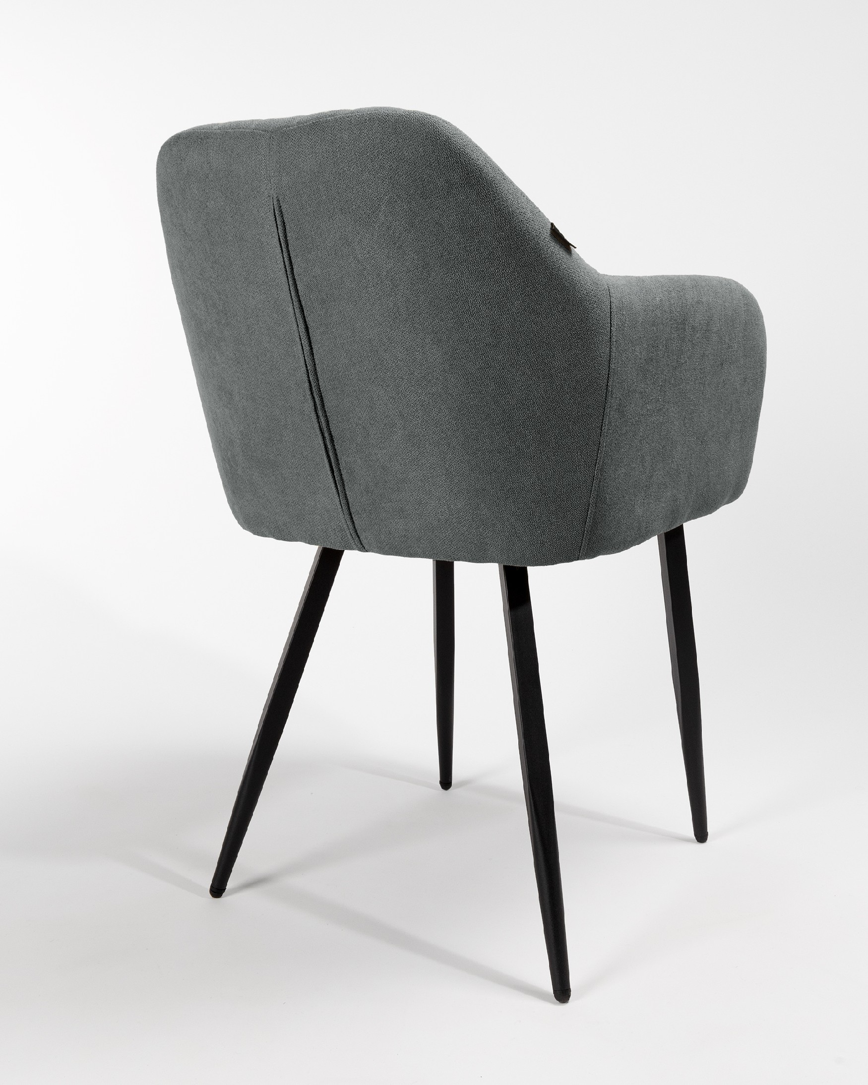 Chicago chair with dark gray upholstery and black metal legs