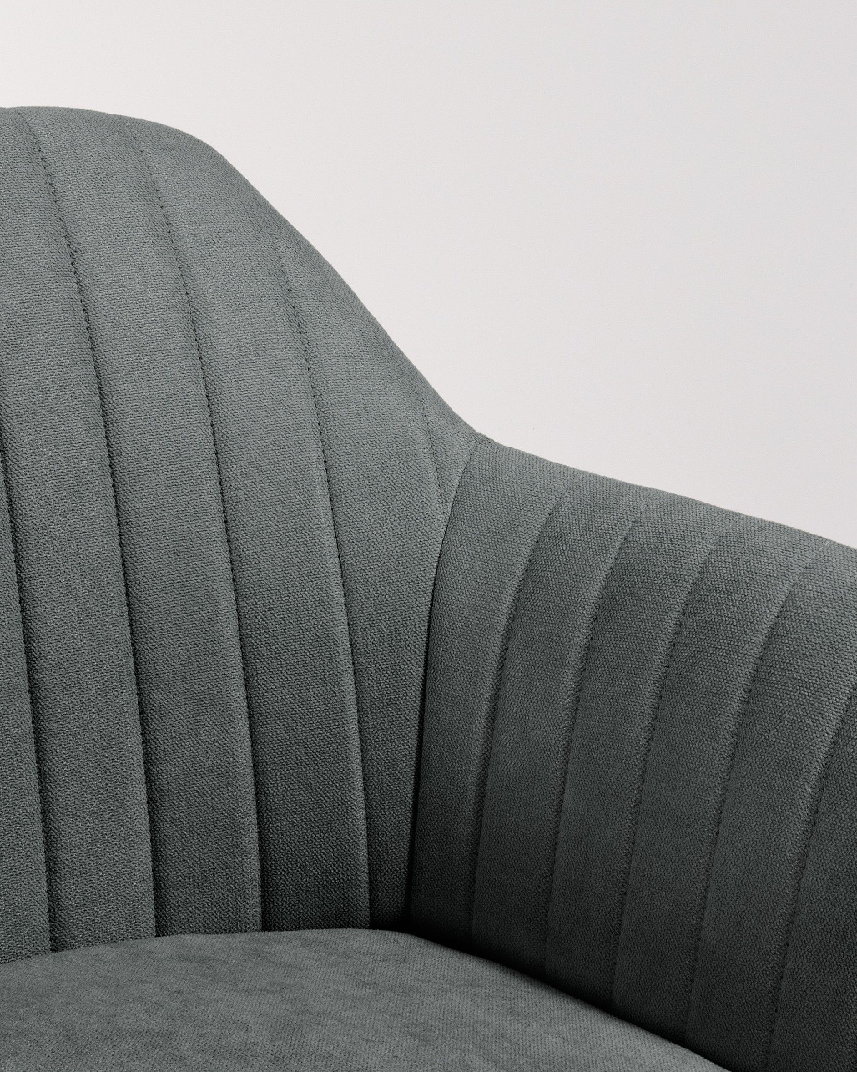 Chicago chair with dark gray upholstery and black metal legs