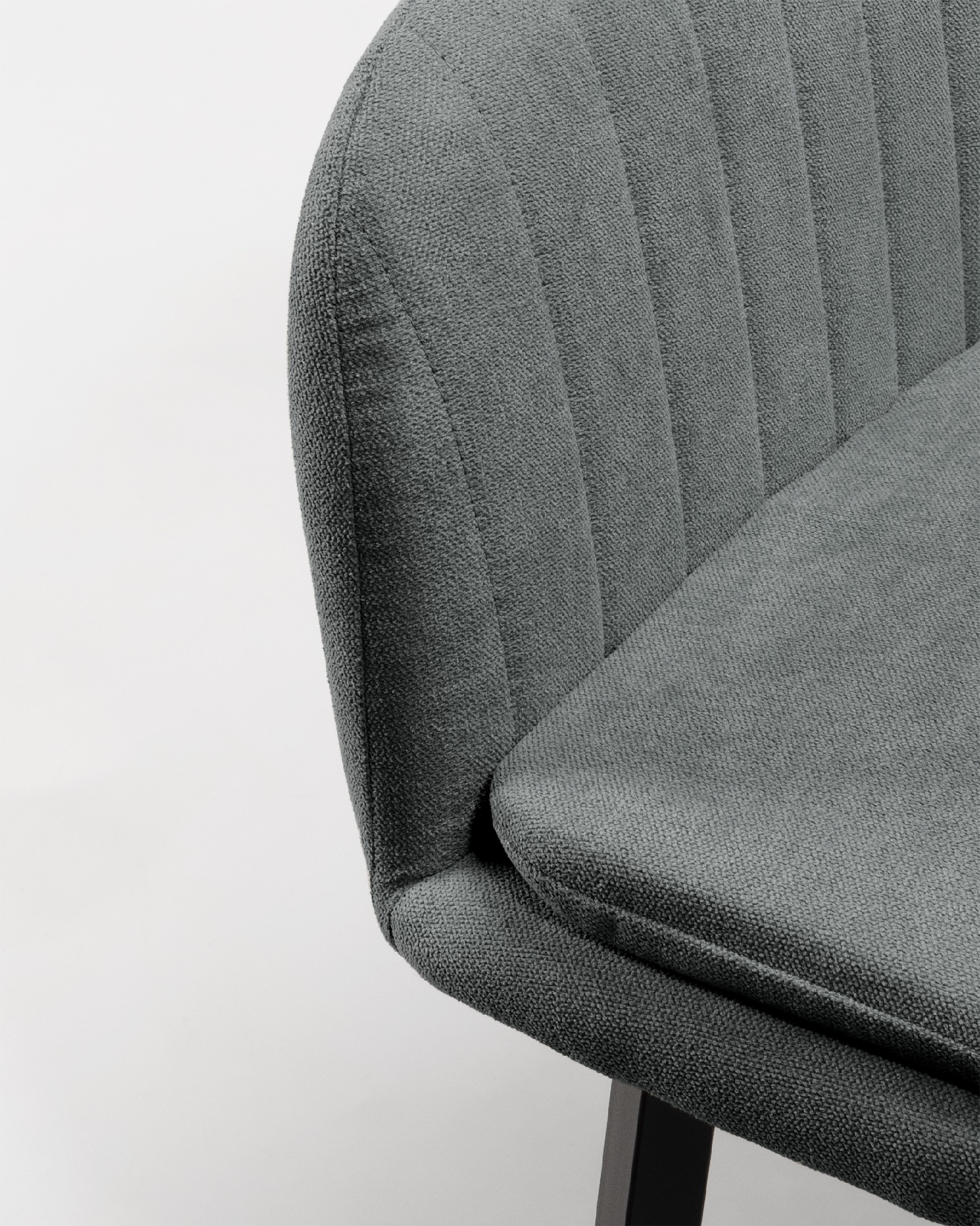 Chicago chair with dark gray upholstery and black metal legs