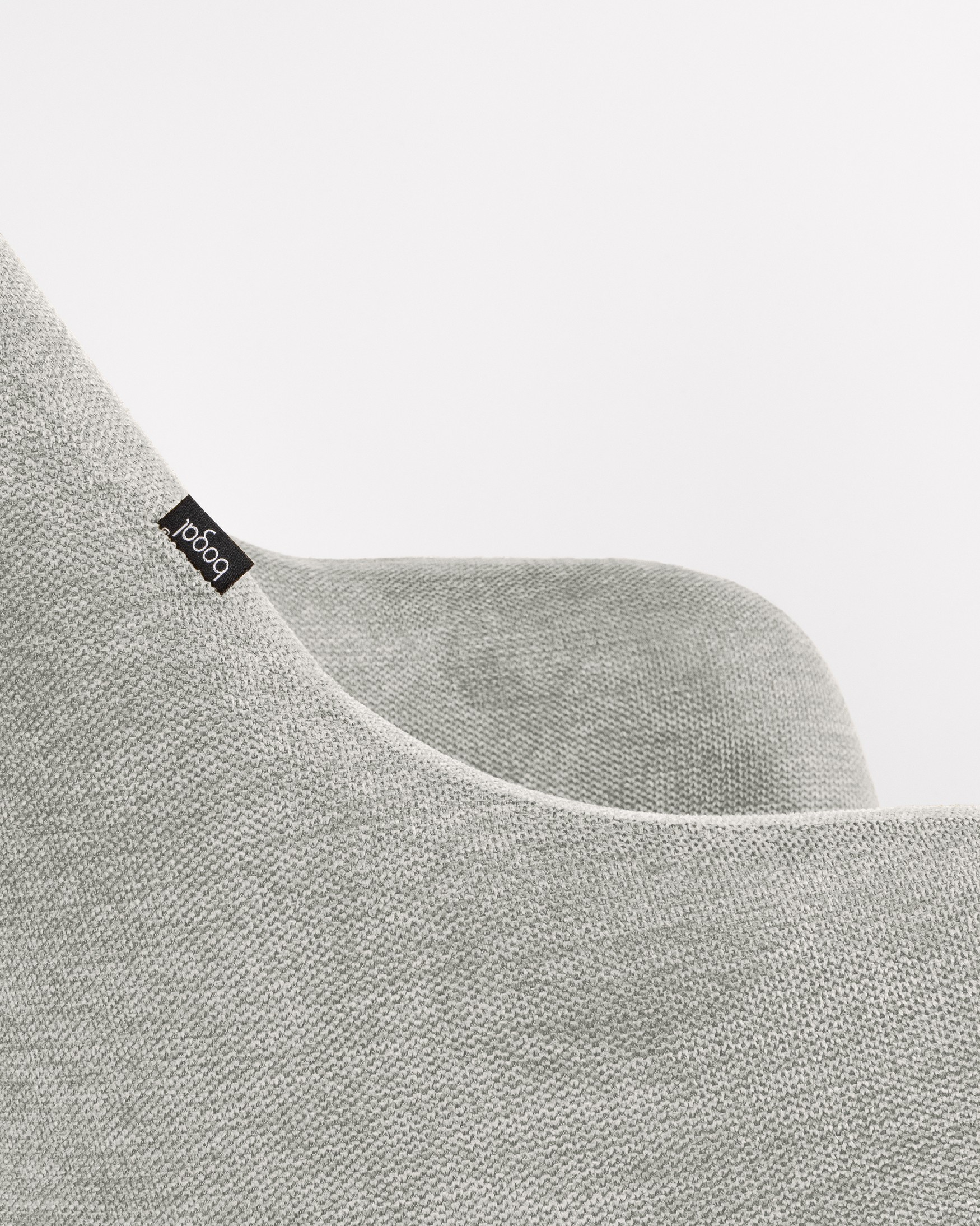 Silla Montreal giratoria 180º con función return, tapizado gris y patas metálicas negras