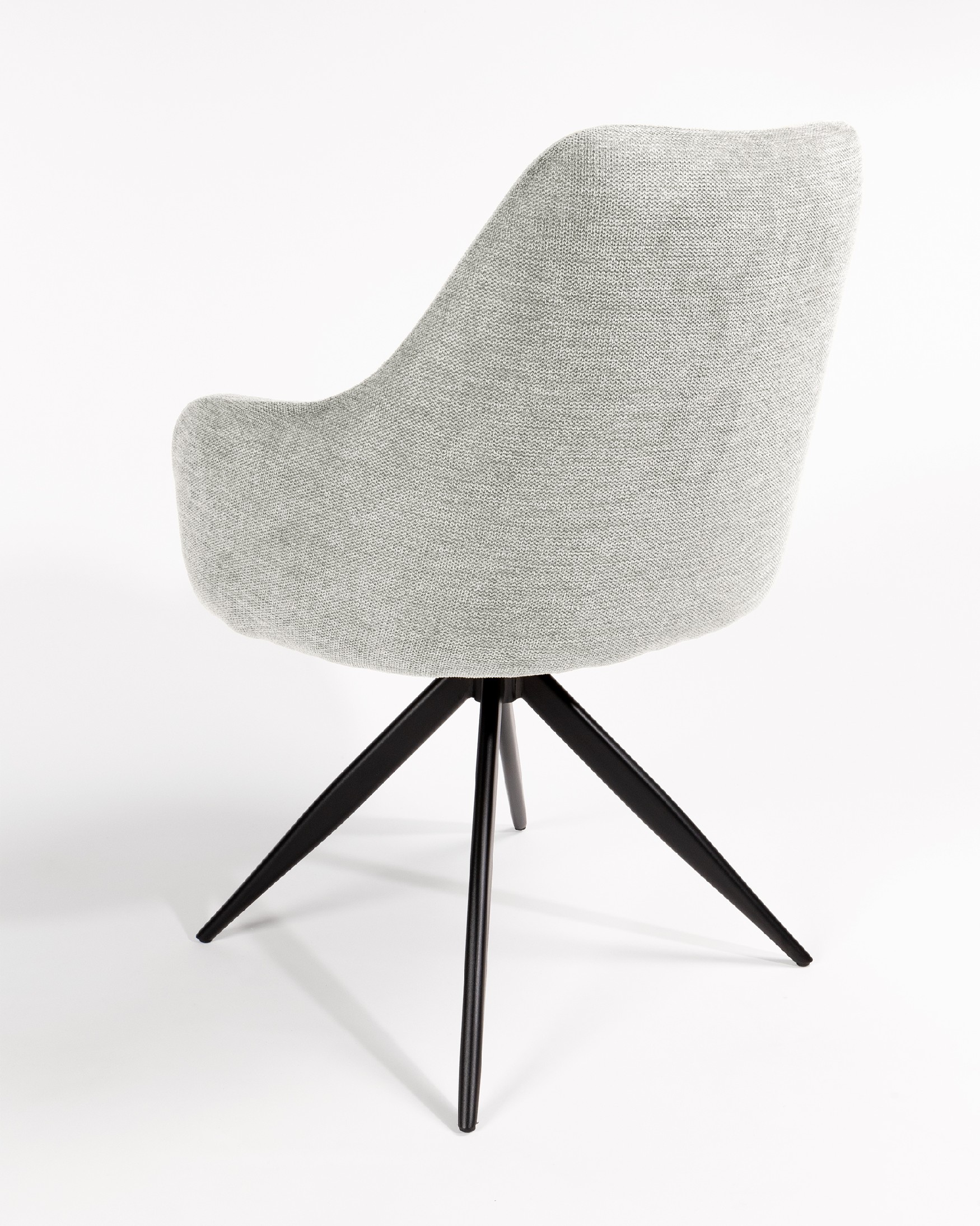 Silla Montreal giratoria 180º con función return, tapizado gris y patas metálicas negras