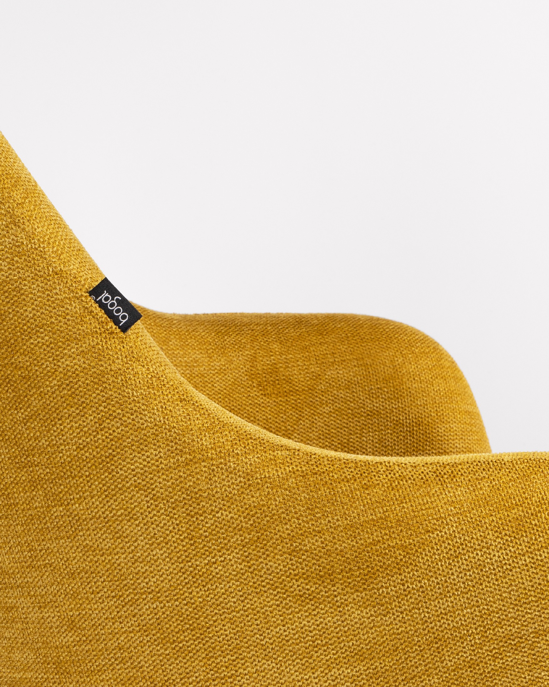 Montreal swivel chair 180º with return function, mustard upholstery, and black metal legs