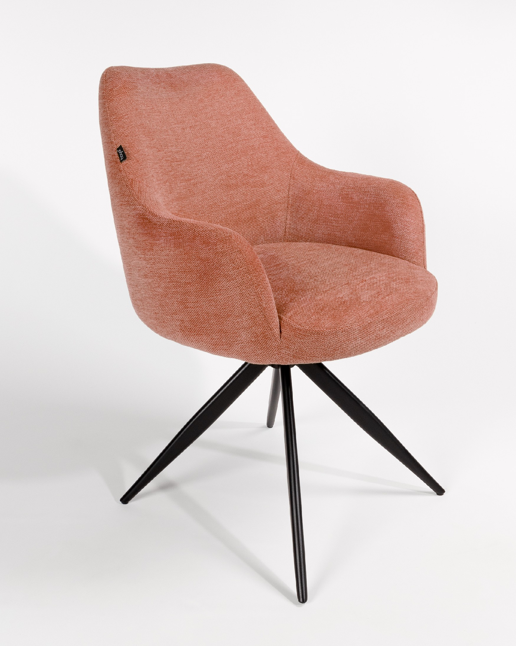 Silla Montreal giratoria 180º con función return, tapizado salmón y patas metálicas negras