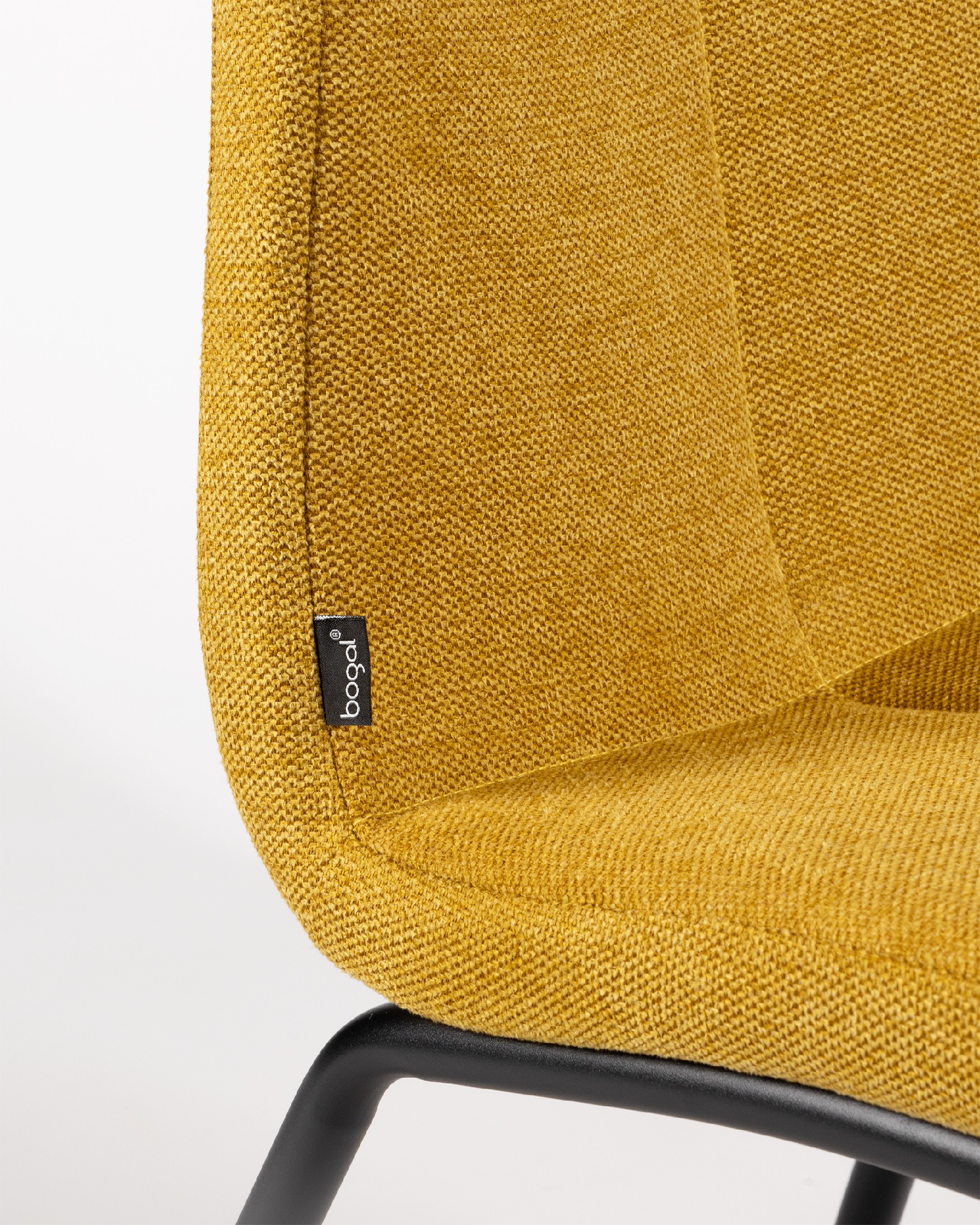Niza chair with mustard upholstery and black metal legs