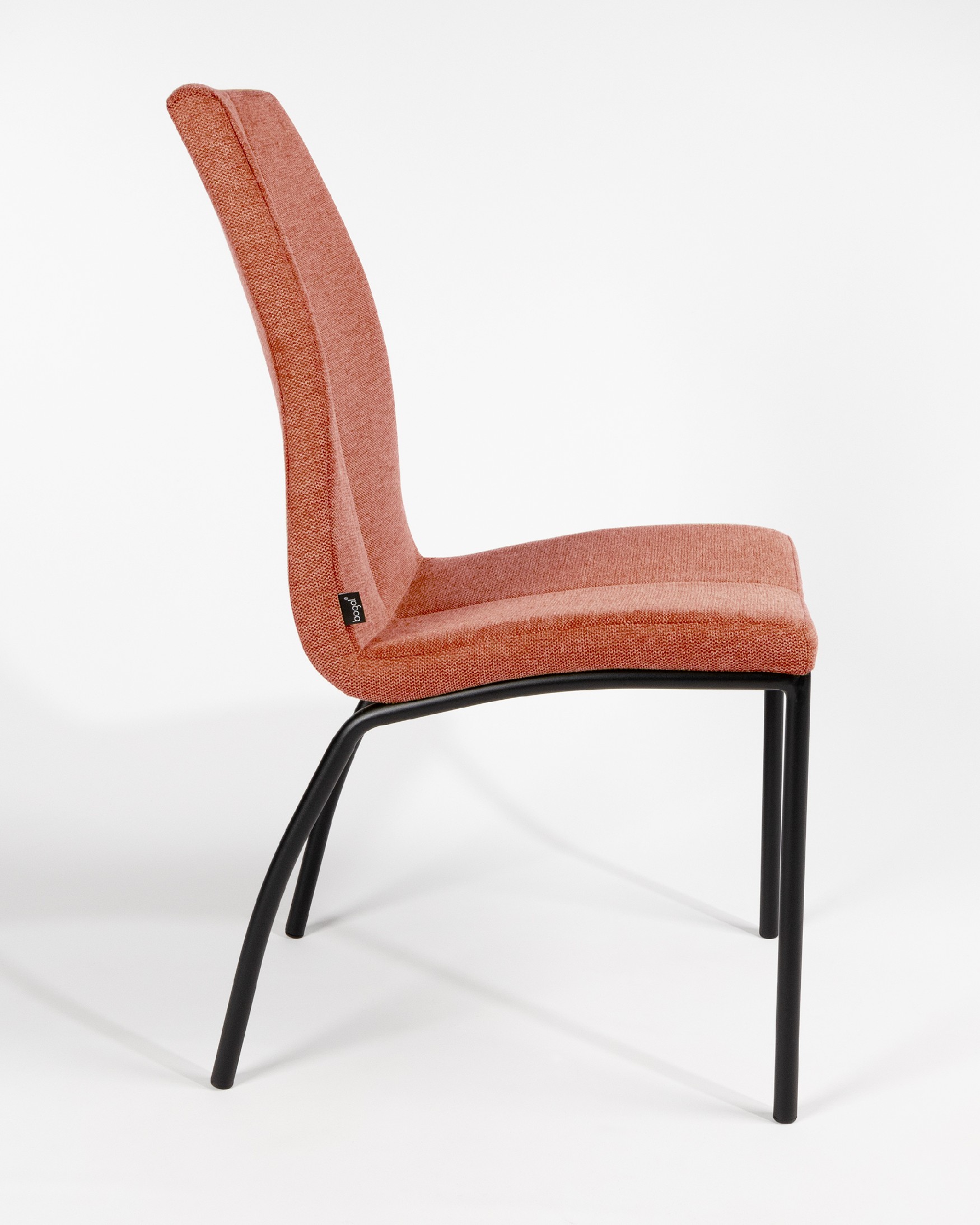 Niza chair with salmon upholstery and black metal legs