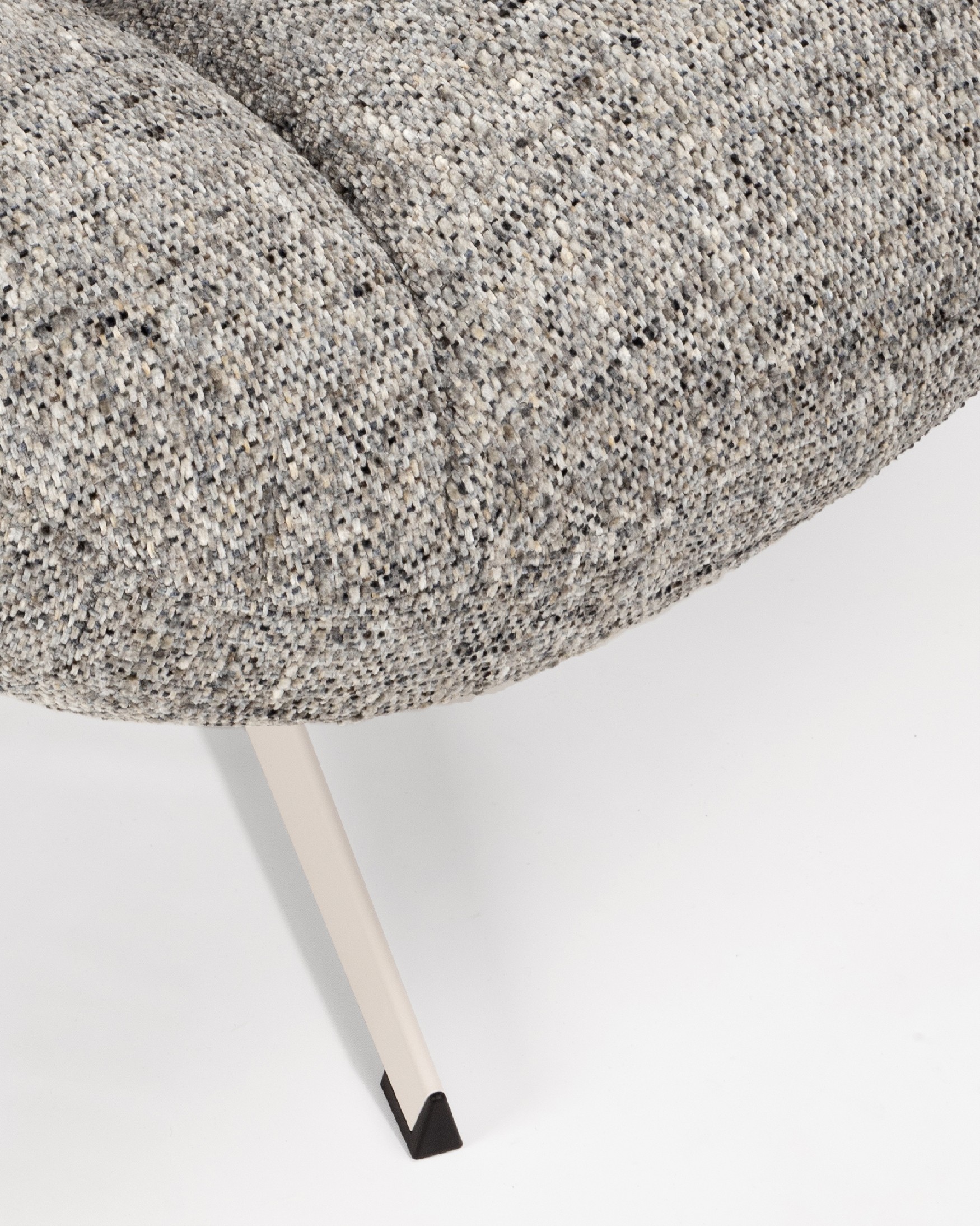 Nolia armchair with storm upholstery and ivory metal base, 360° swivel