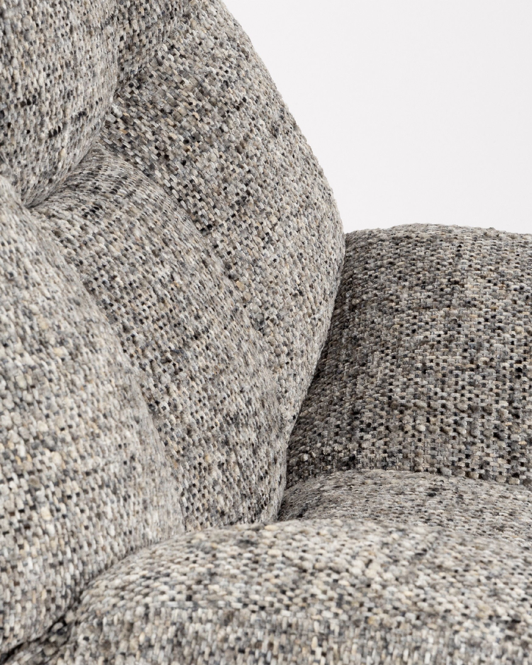 Nolia armchair with storm upholstery and ivory metal base, 360° swivel