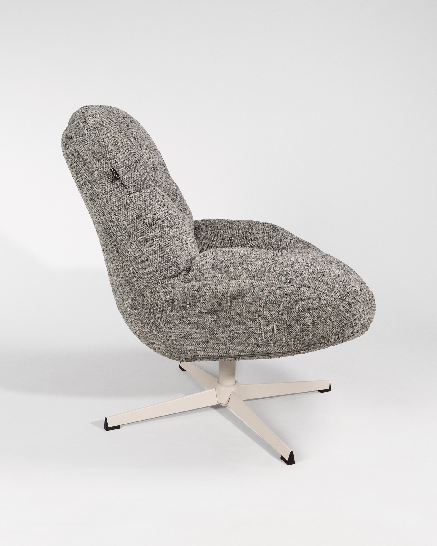 Nolia armchair with storm upholstery and ivory metal base, 360° swivel