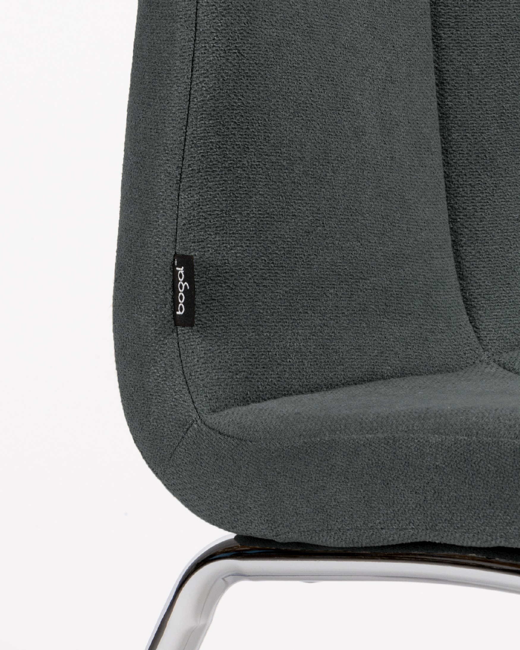 Zagreb chair with dark upholstery and chrome legs