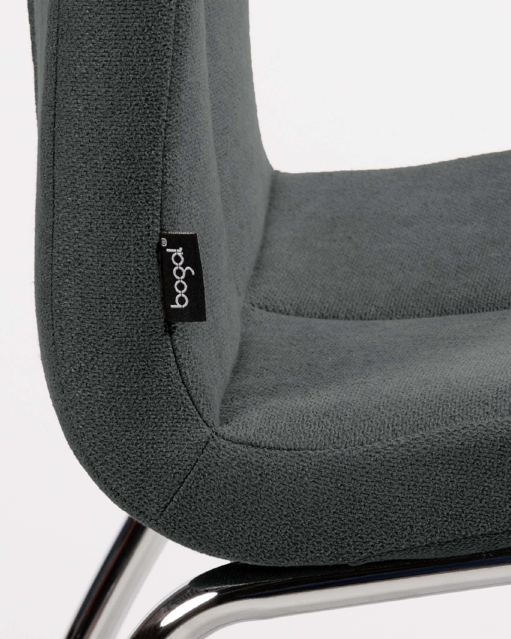 Zagreb chair with dark upholstery and chrome legs