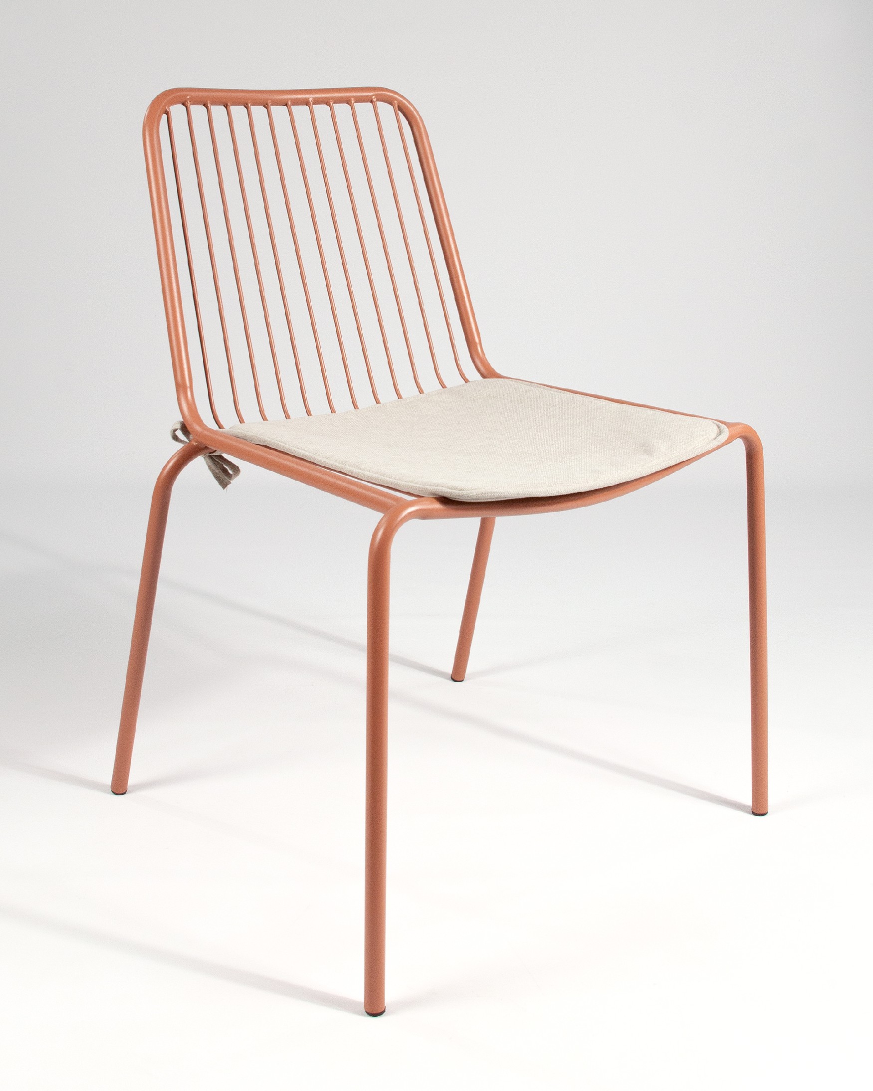 Silla Aloha de metal teja con cojín