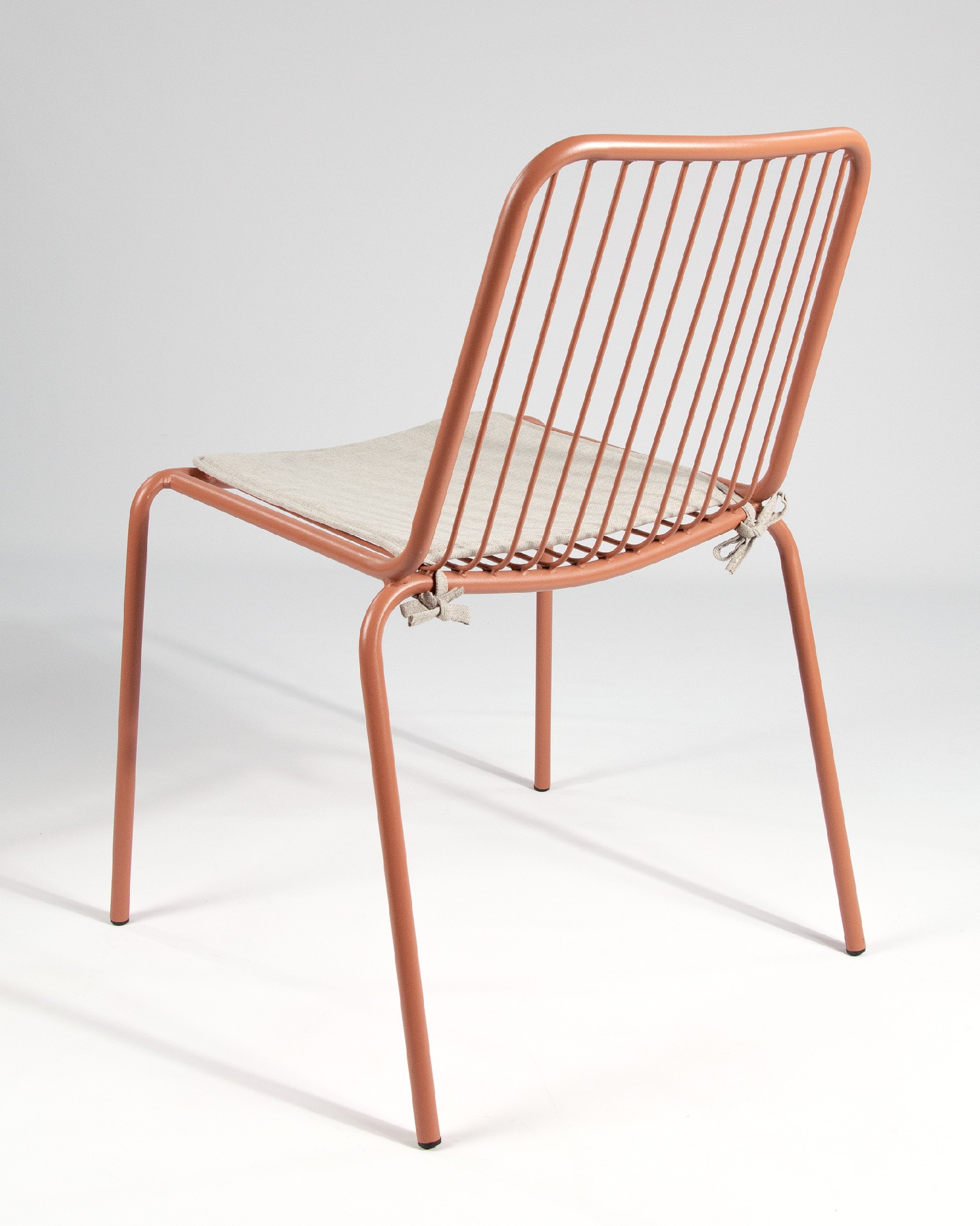 Silla Aloha de metal teja con cojín