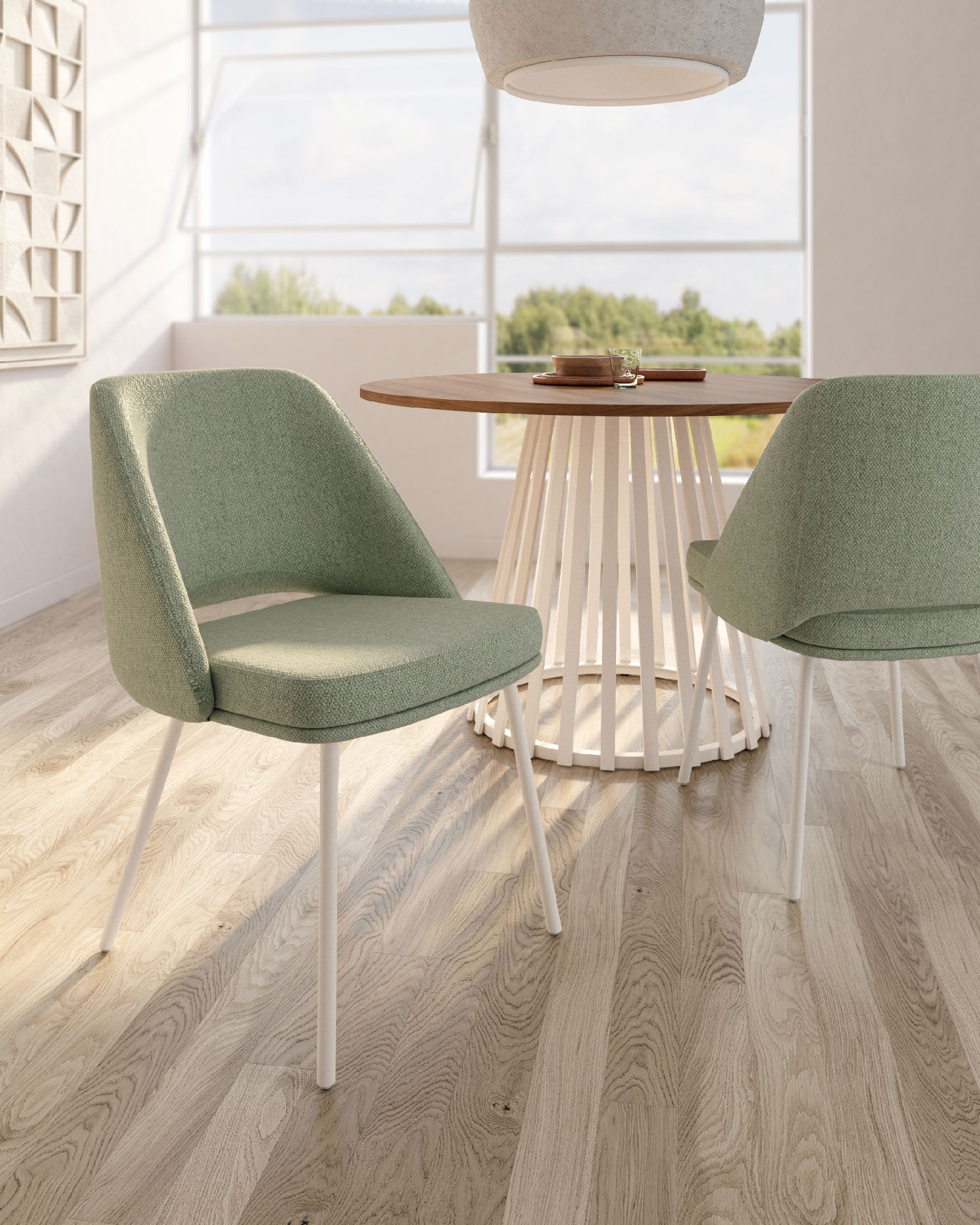 Aman chair with green upholstery and ivory metal legs