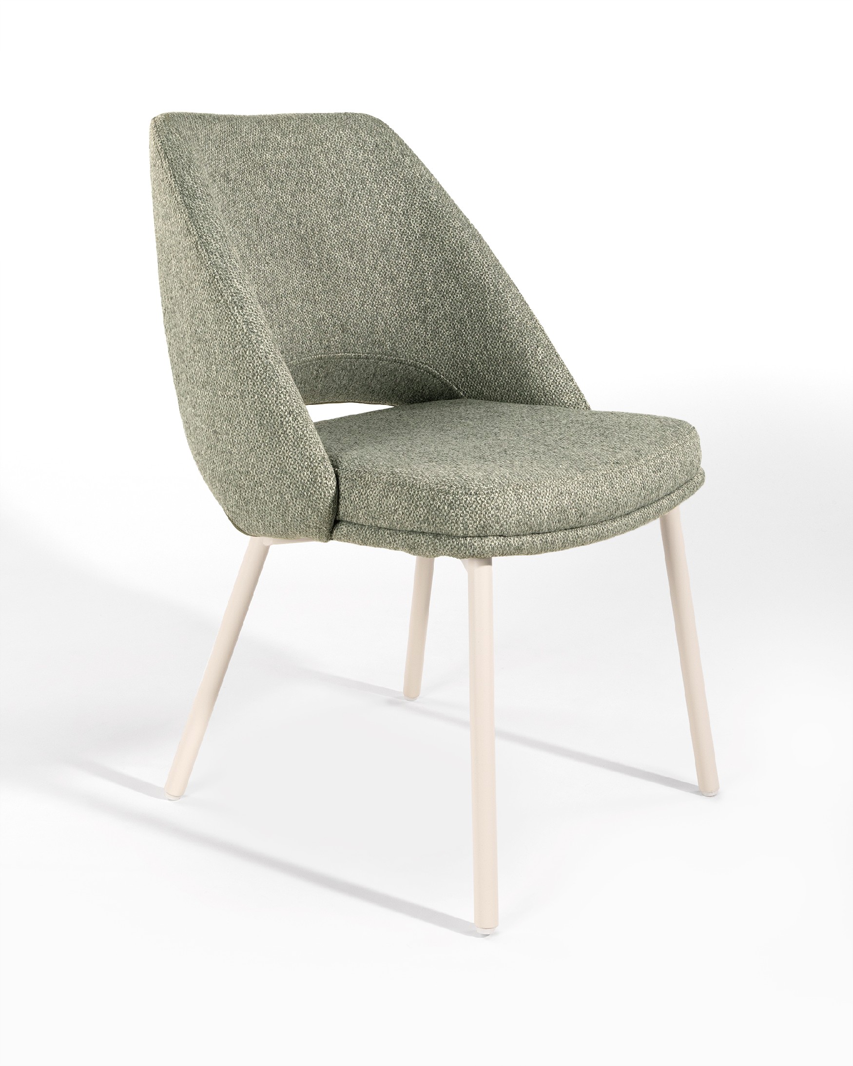 Aman chair with green upholstery and ivory metal legs