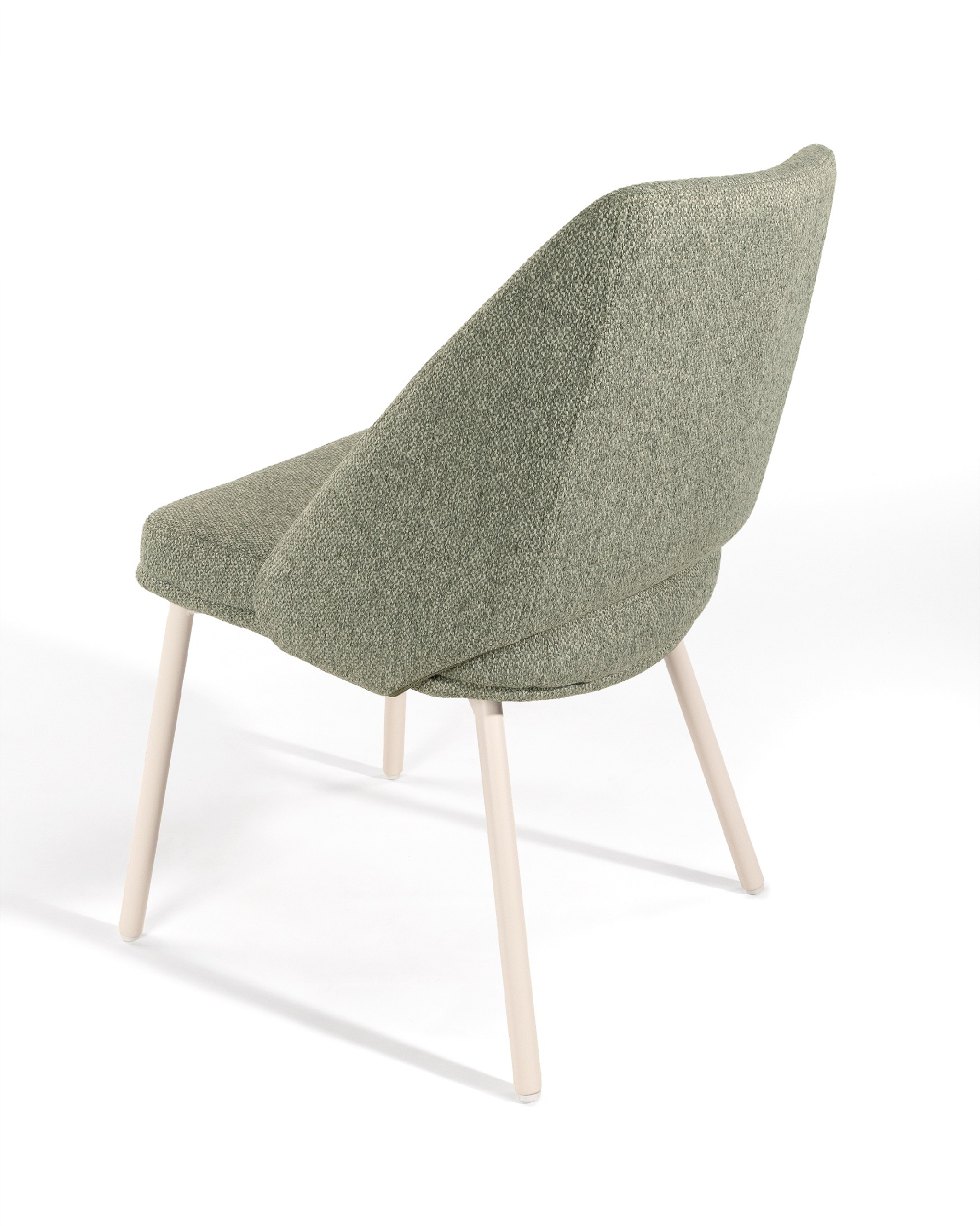 Aman chair with green upholstery and ivory metal legs