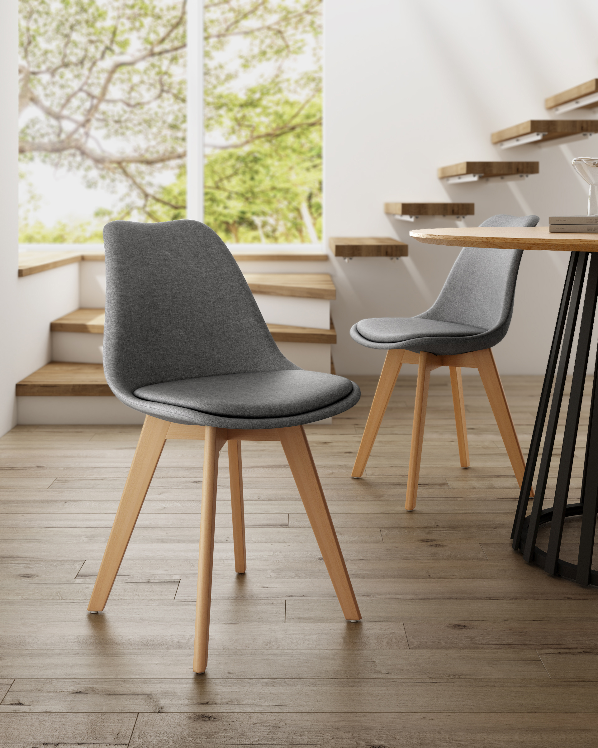 Amsterdam chair with gray upholstery and wooden legs