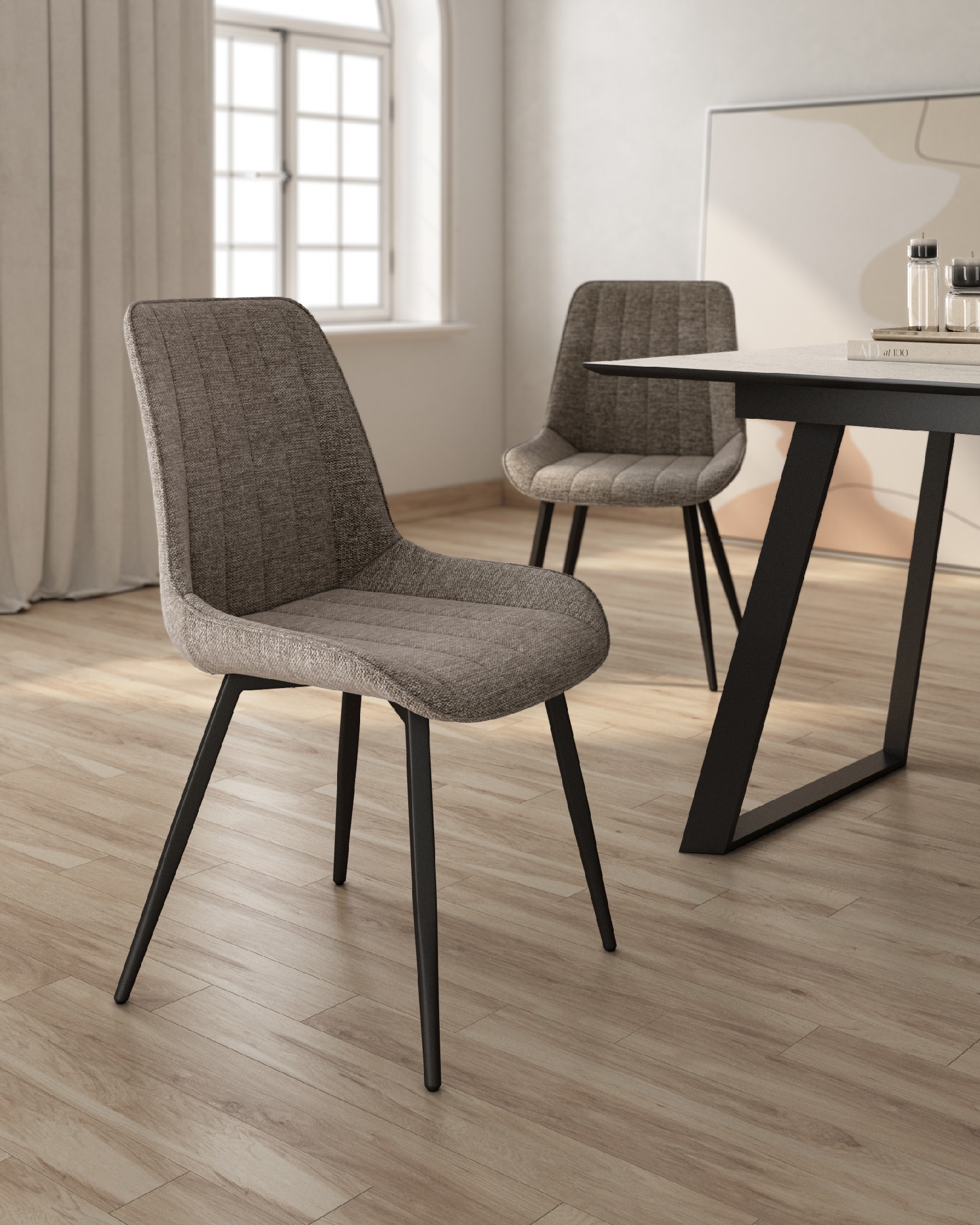Ankara chair with brown upholstery and black legs