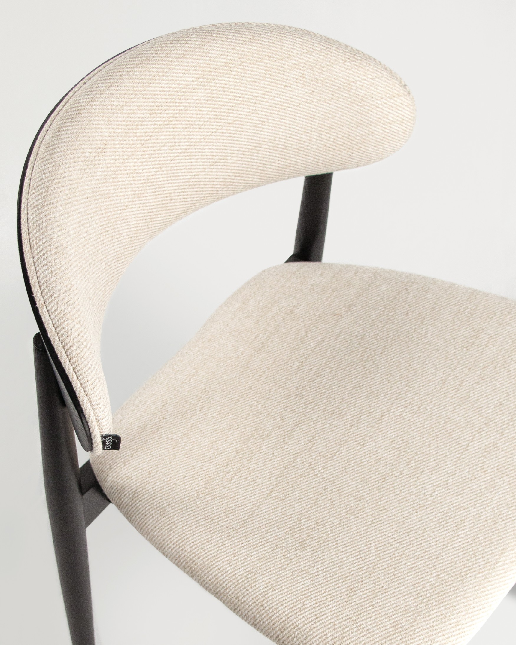 Ariel chair with mother-of-pearl upholstery and black oak frame