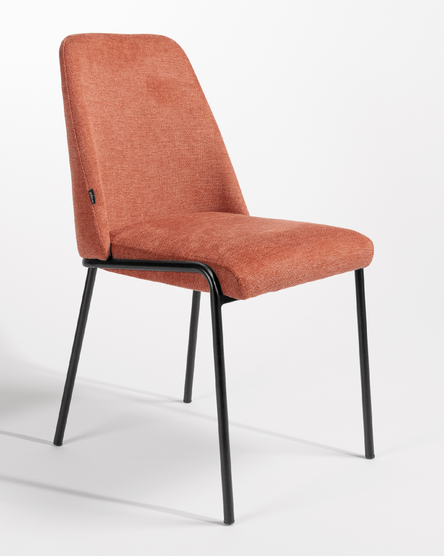 Atlanta chair with salmon upholstery and black metal legs
