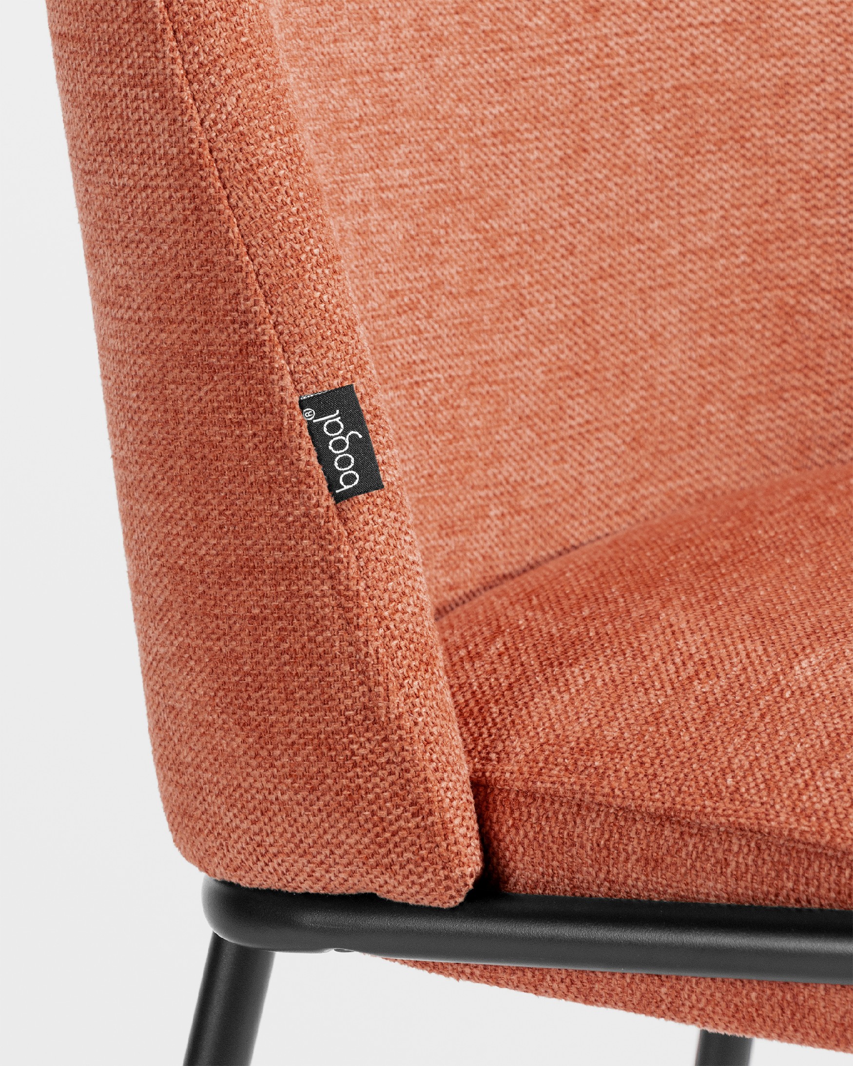 Atlanta chair with salmon upholstery and black metal legs