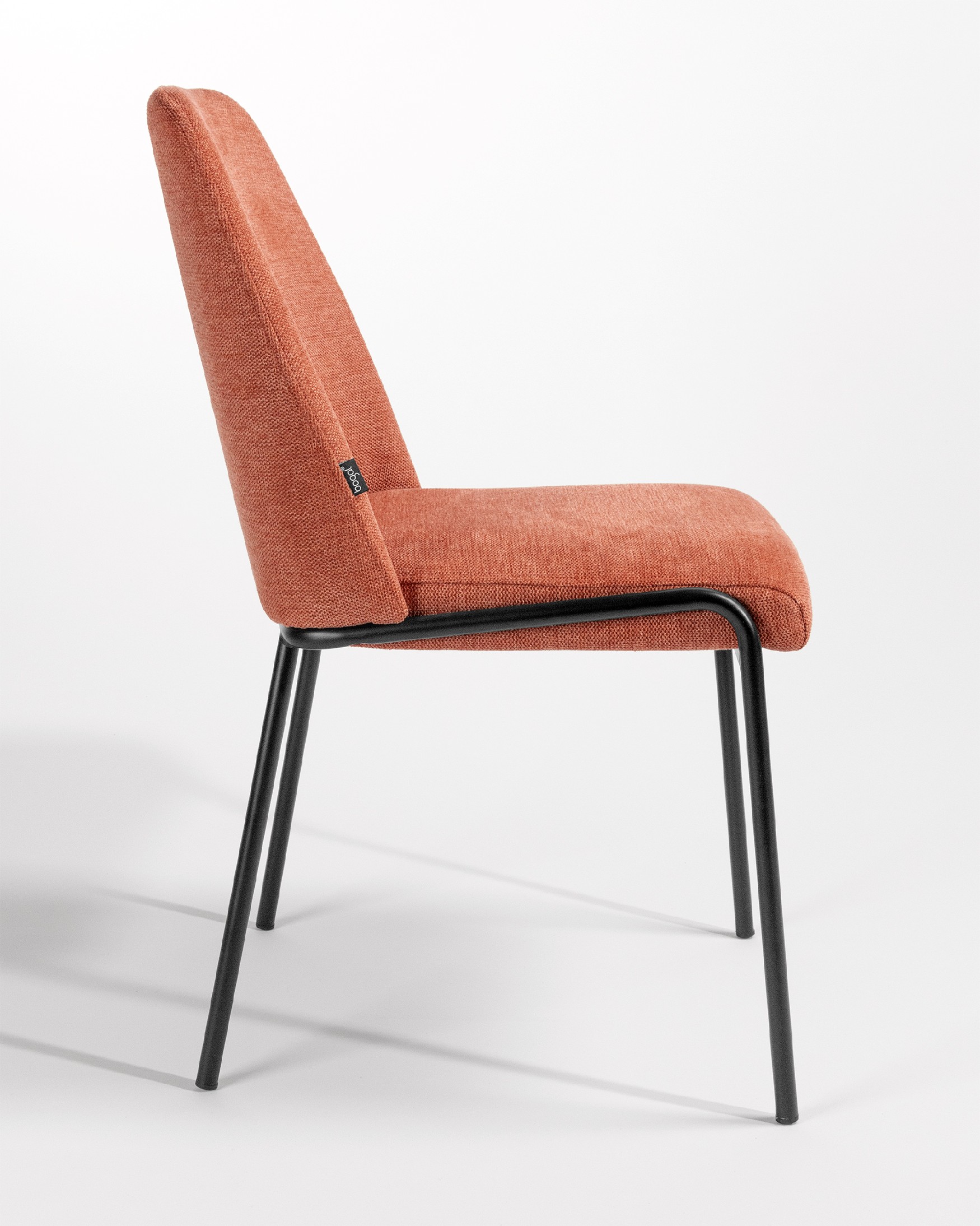 Atlanta chair with salmon upholstery and black metal legs