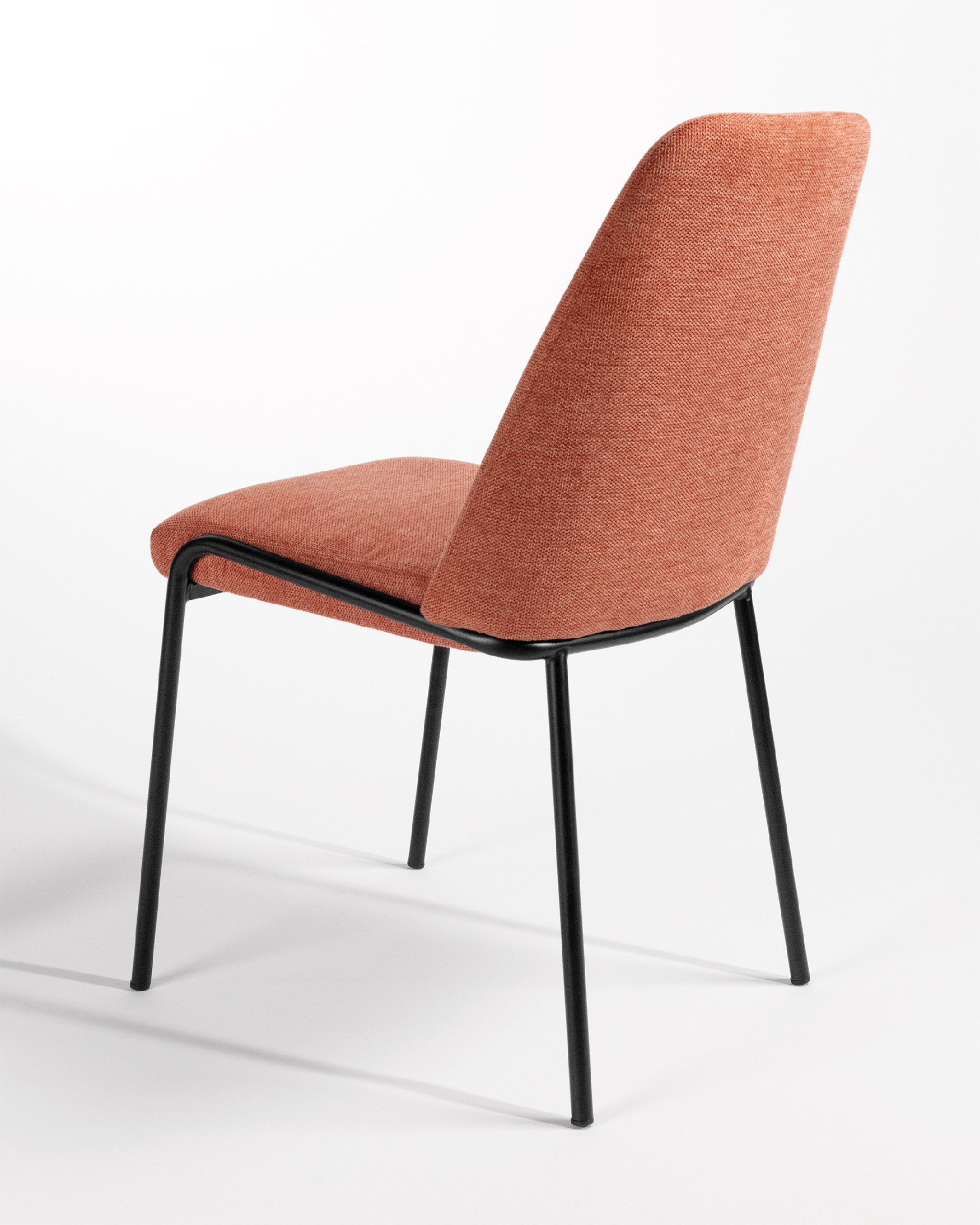 Atlanta chair with salmon upholstery and black metal legs