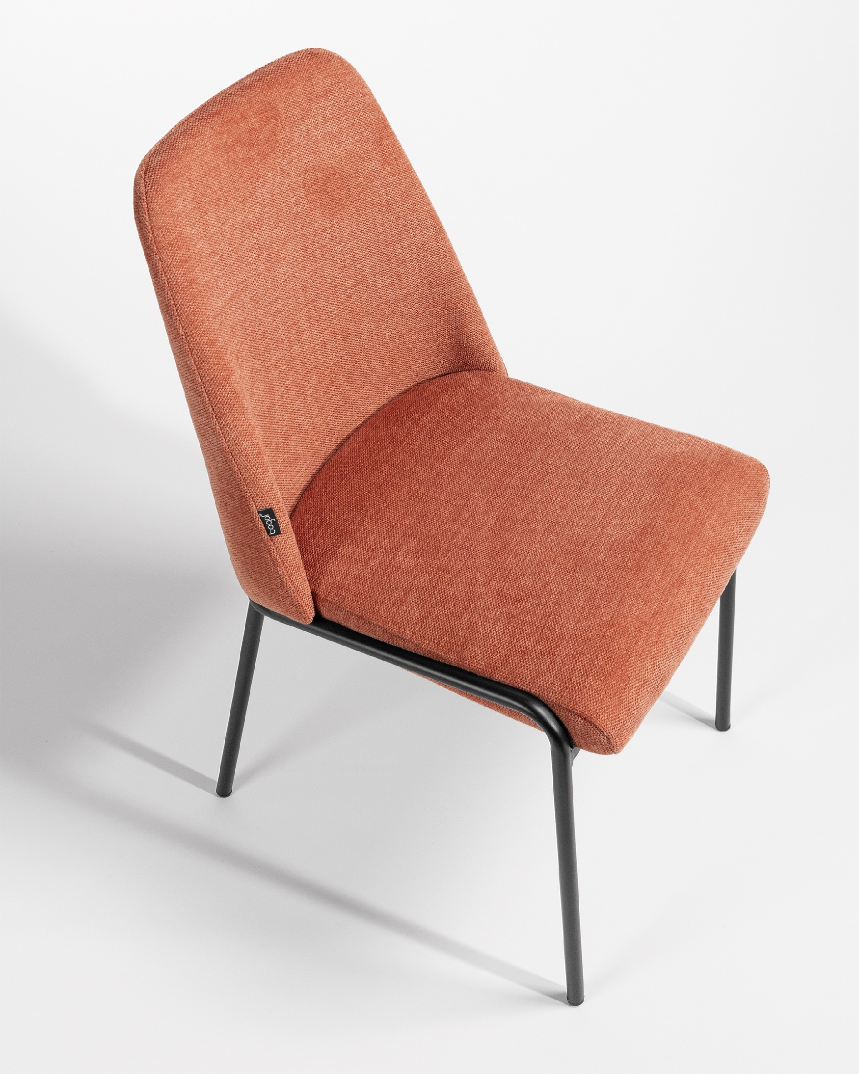 Atlanta chair with salmon upholstery and black metal legs