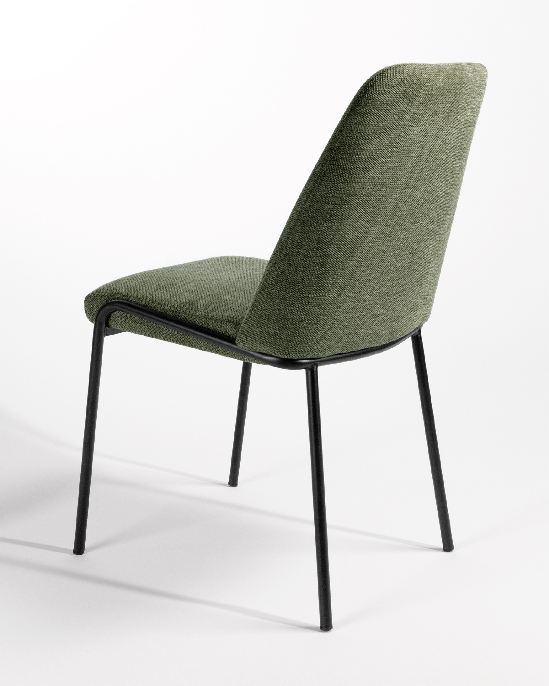 Atlanta chair with green upholstery and black metal legs