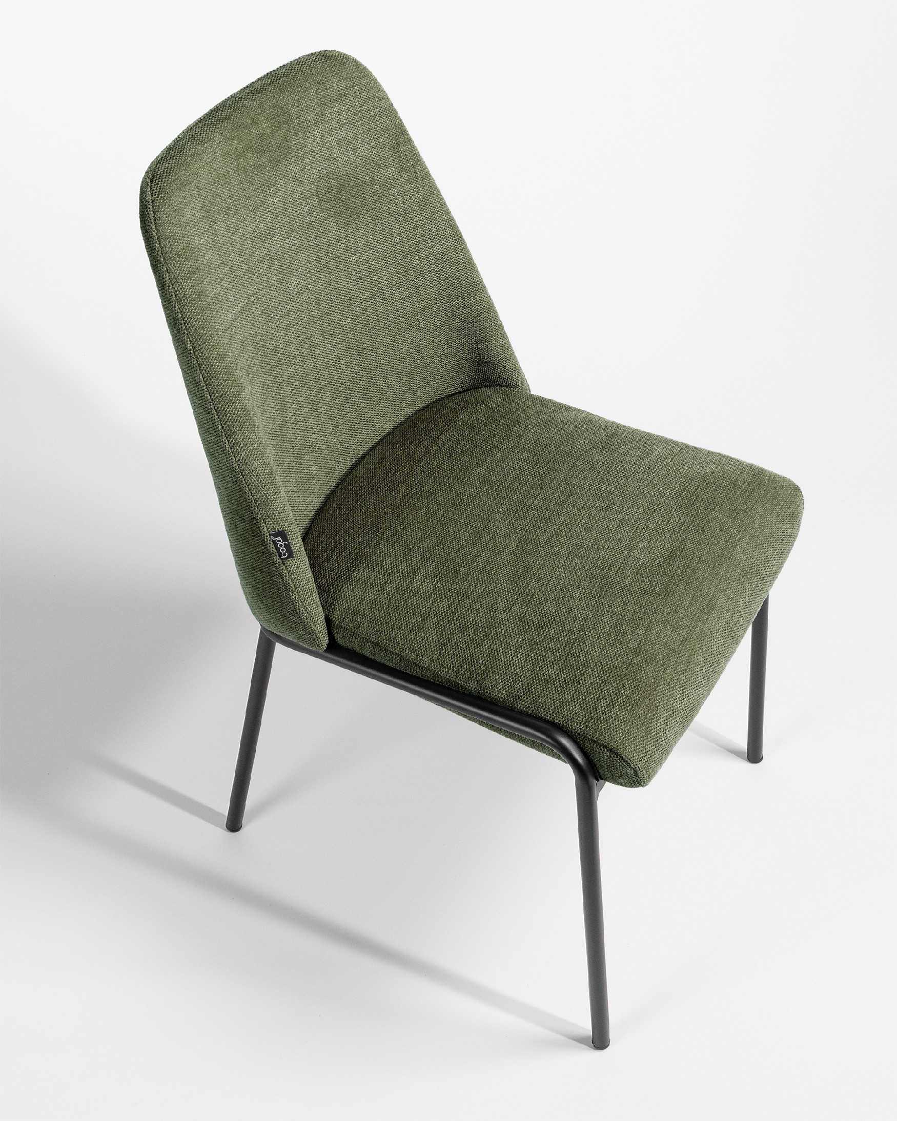 Atlanta chair with green upholstery and black metal legs