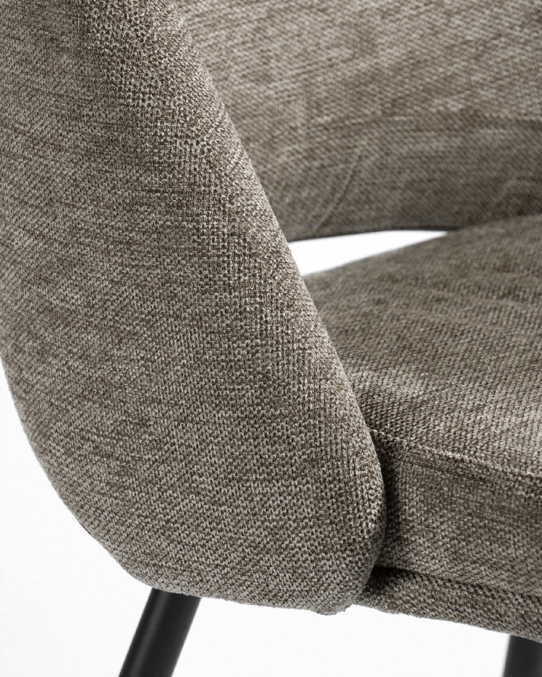Beirut chair with brown upholstery and black metal legs
